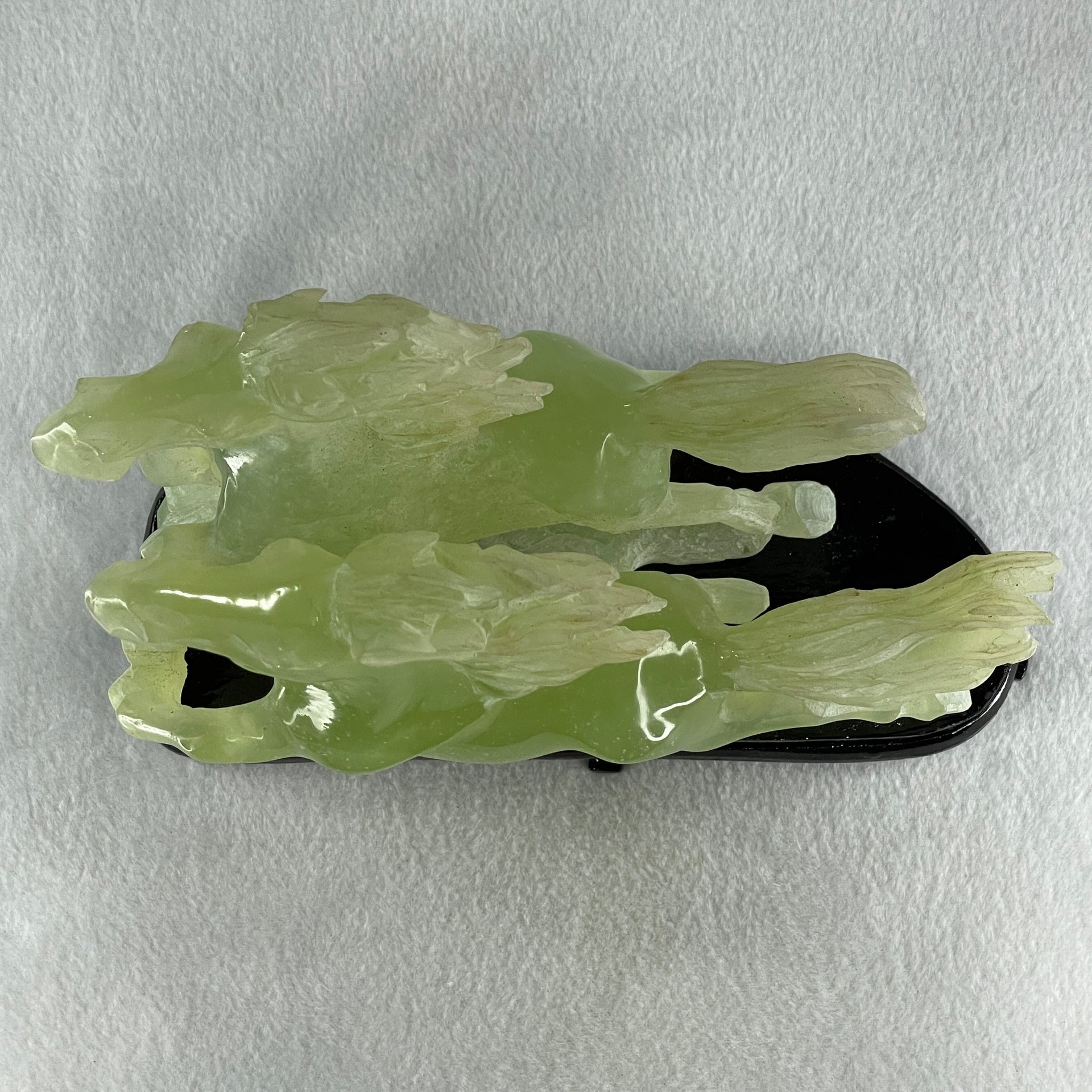 Natural Semi Icy Green Serpentine Double Horse with Wooden Stand Display 1119.9g 190.0 by 166.0 by 96.0mm - Huangs Jadeite and Jewelry Pte Ltd