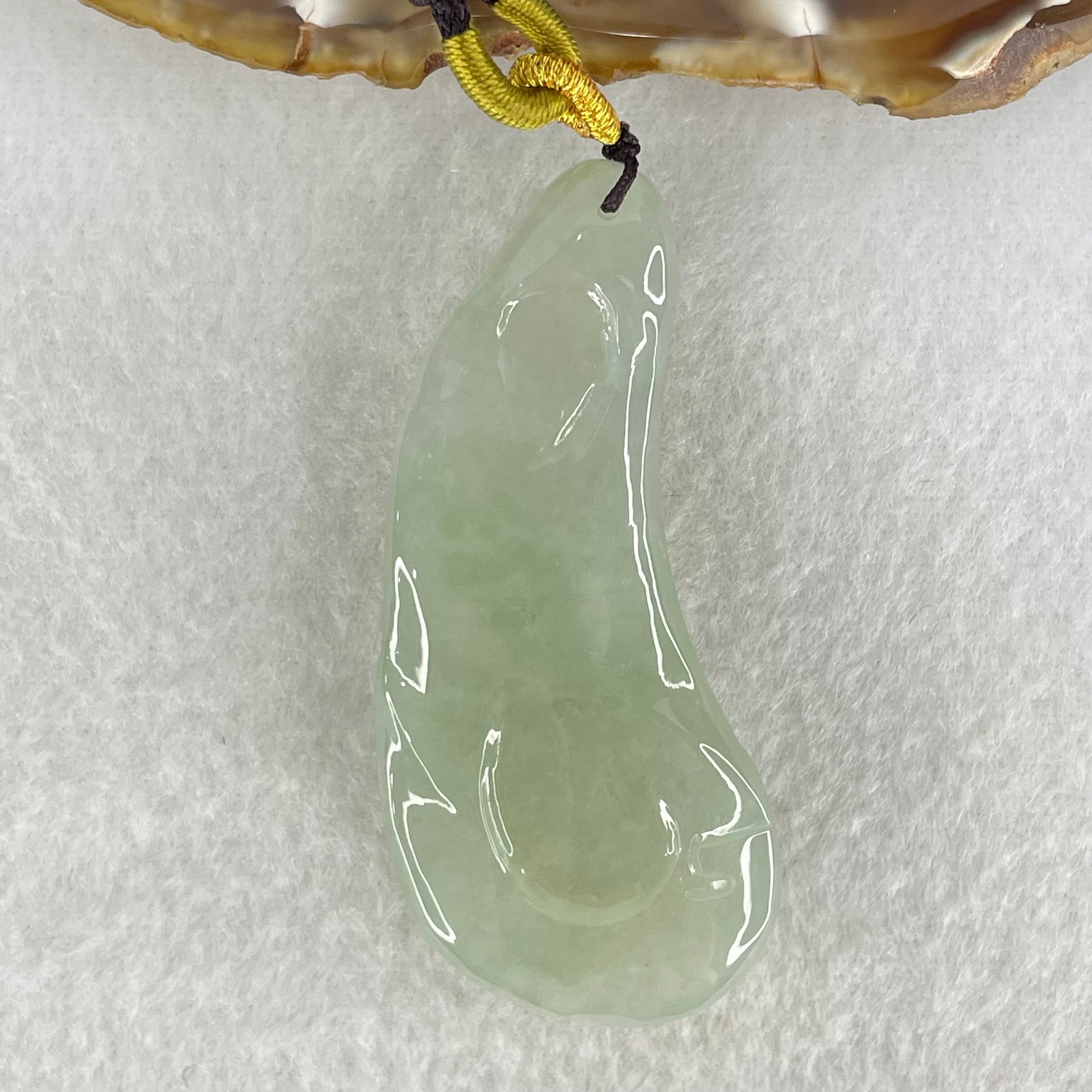 Type A Jelly Light Green Jadeite Buddha and Good Vs Evil Pendant 31.00g 61.2 by 27.0 by 11.4mm - Huangs Jadeite and Jewelry Pte Ltd