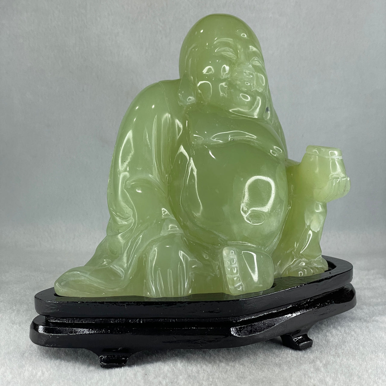 Natural Green Serpentine Siting Milo Buddha with Wealth Pot with Wooden Stand Display 1362.0g 165.0 by 110.0 by 150.0mm - Huangs Jadeite and Jewelry Pte Ltd