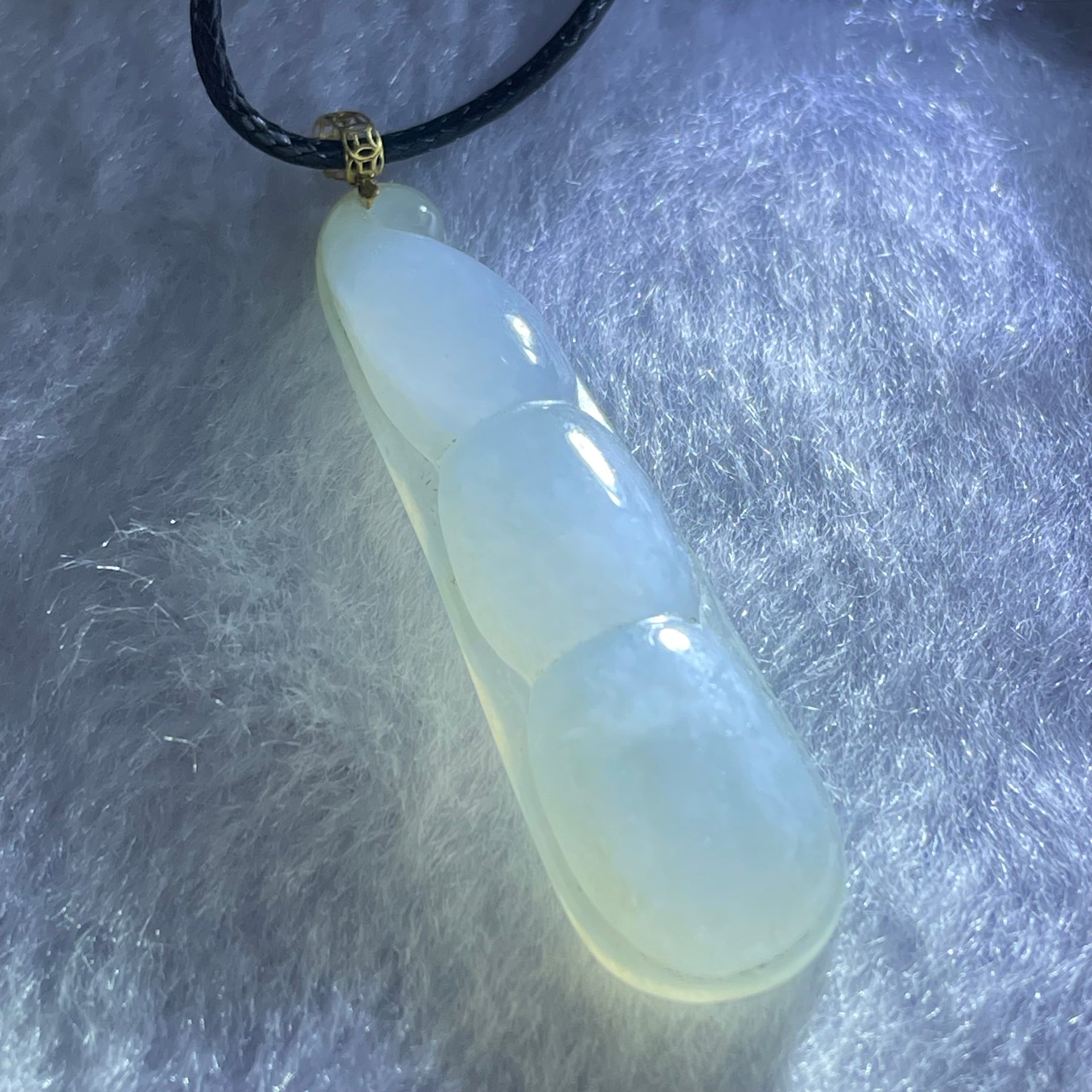 Type A Faint Green Jadeite Peapod Pendent 6.17g 39.1 by 11.3 by 7.1mm - Huangs Jadeite and Jewelry Pte Ltd