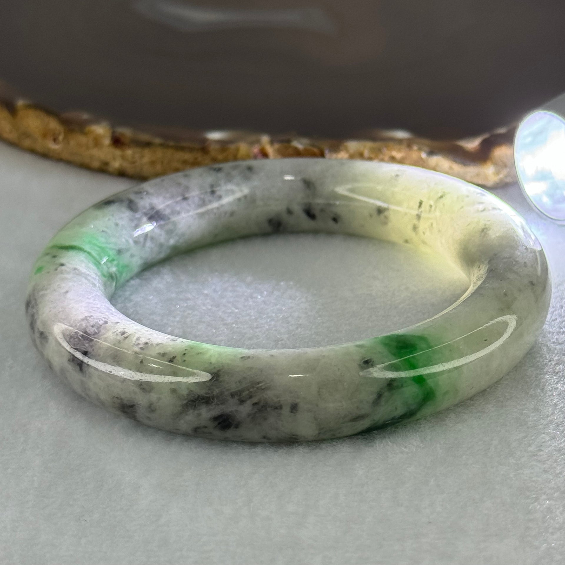 Type A Light Green with Emerald Green and Grey Patches Jadeite Bangle Internal Diameter 55.8mm 93.21g 13.4 by 13.1mm (Very Slight External Rough with Slight Internal Lines) - Huangs Jadeite and Jewelry Pte Ltd