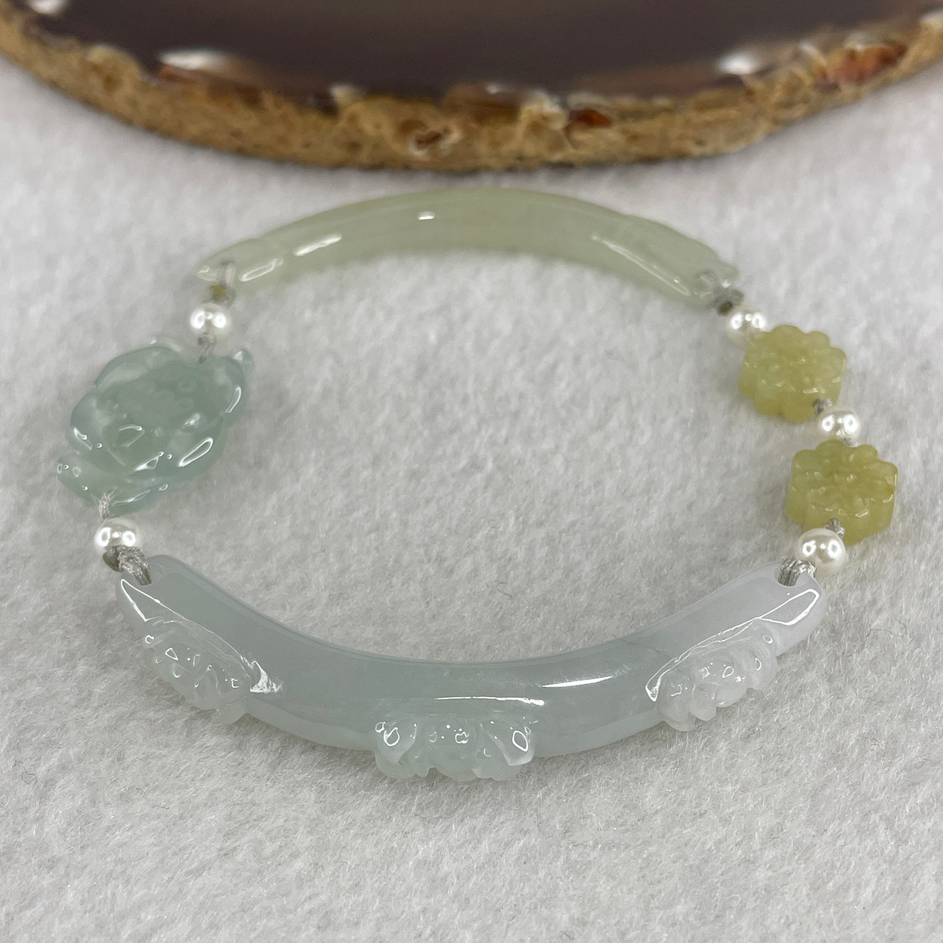 Natural Type A Semi Icy Light Green with Light Lavender Jadeite Flower Bracelet 16.97g 18cm 5.9 by 9.1mm - 22.6 by 14.1 by 5.5mm - Huangs Jadeite and Jewelry Pte Ltd