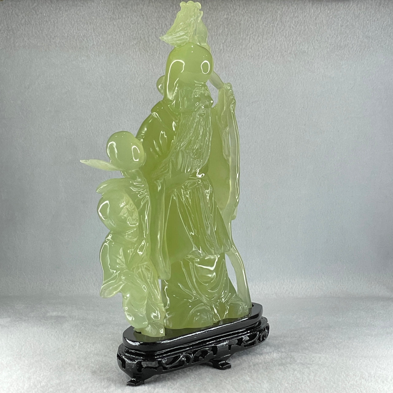 Natural Green Serpentine Shou Xing Gong and Tong Zi with Wooden Stand Display 1,535.1g 160.0 by 276.0 by 68.0mm - Huangs Jadeite and Jewelry Pte Ltd