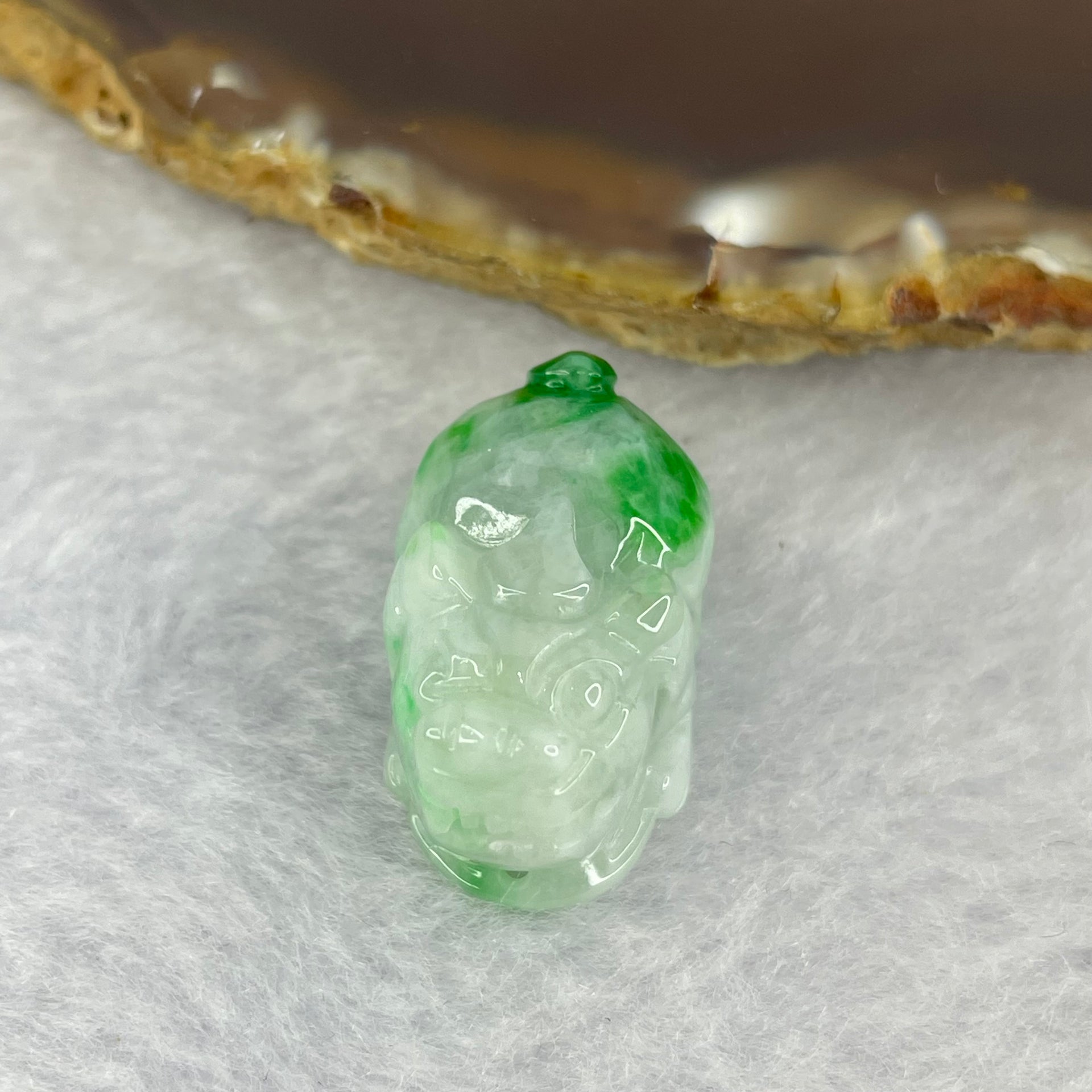 Type A Bright Green with Faint Lavender Jadeite Pixiu Pendent A货辣绿和浅紫罗兰翡翠貔貅吊坠 9.63g 23.5 by 14.6 by 13.3 mm - Huangs Jadeite and Jewelry Pte Ltd
