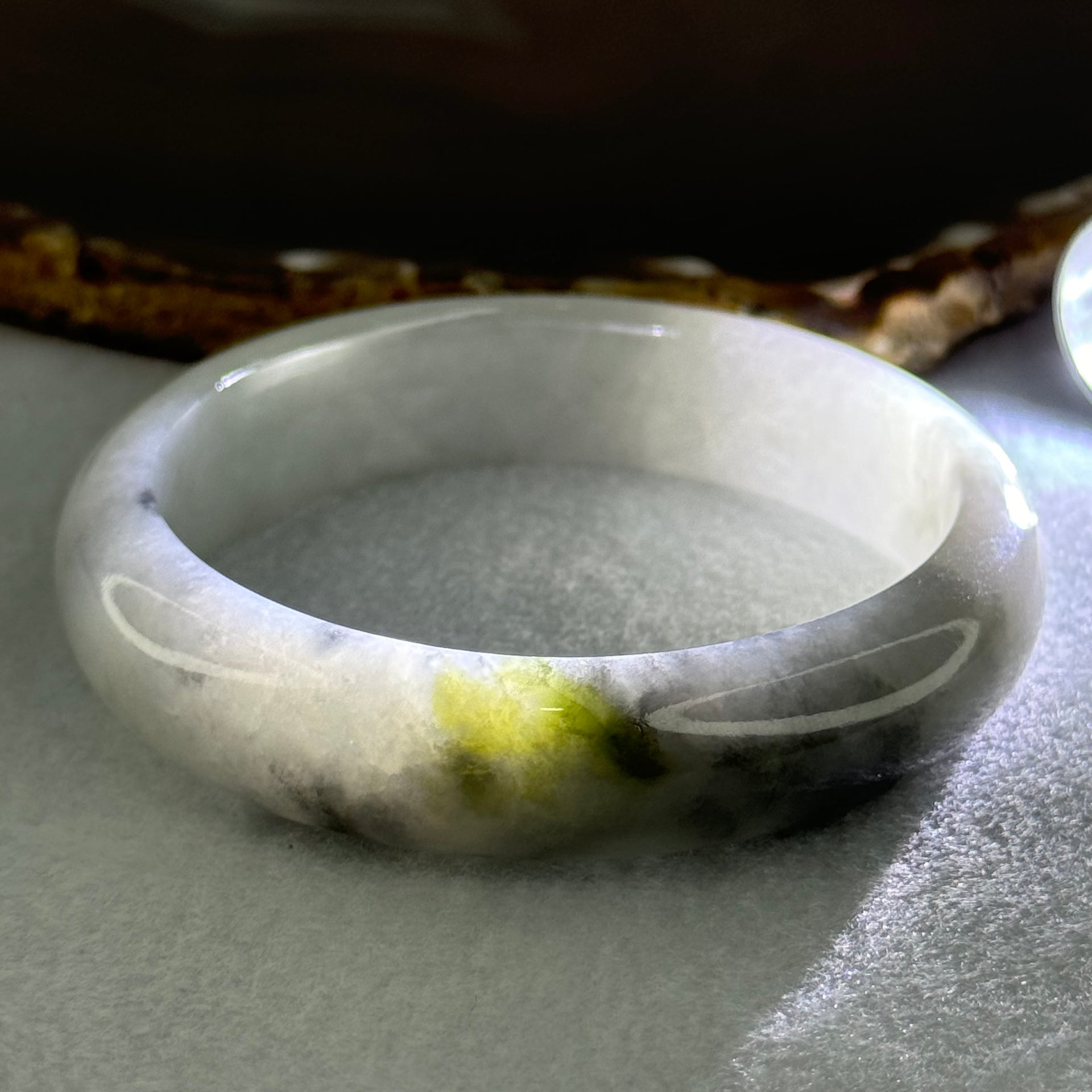Type A Faint Green and Wuji Grey with Yellowish Green Patch Jadeite Bangle Internal Diameter 56.5mm 61.24g 14.3 by 8.0mm (Very Slight Internal Lines) - Huangs Jadeite and Jewelry Pte Ltd
