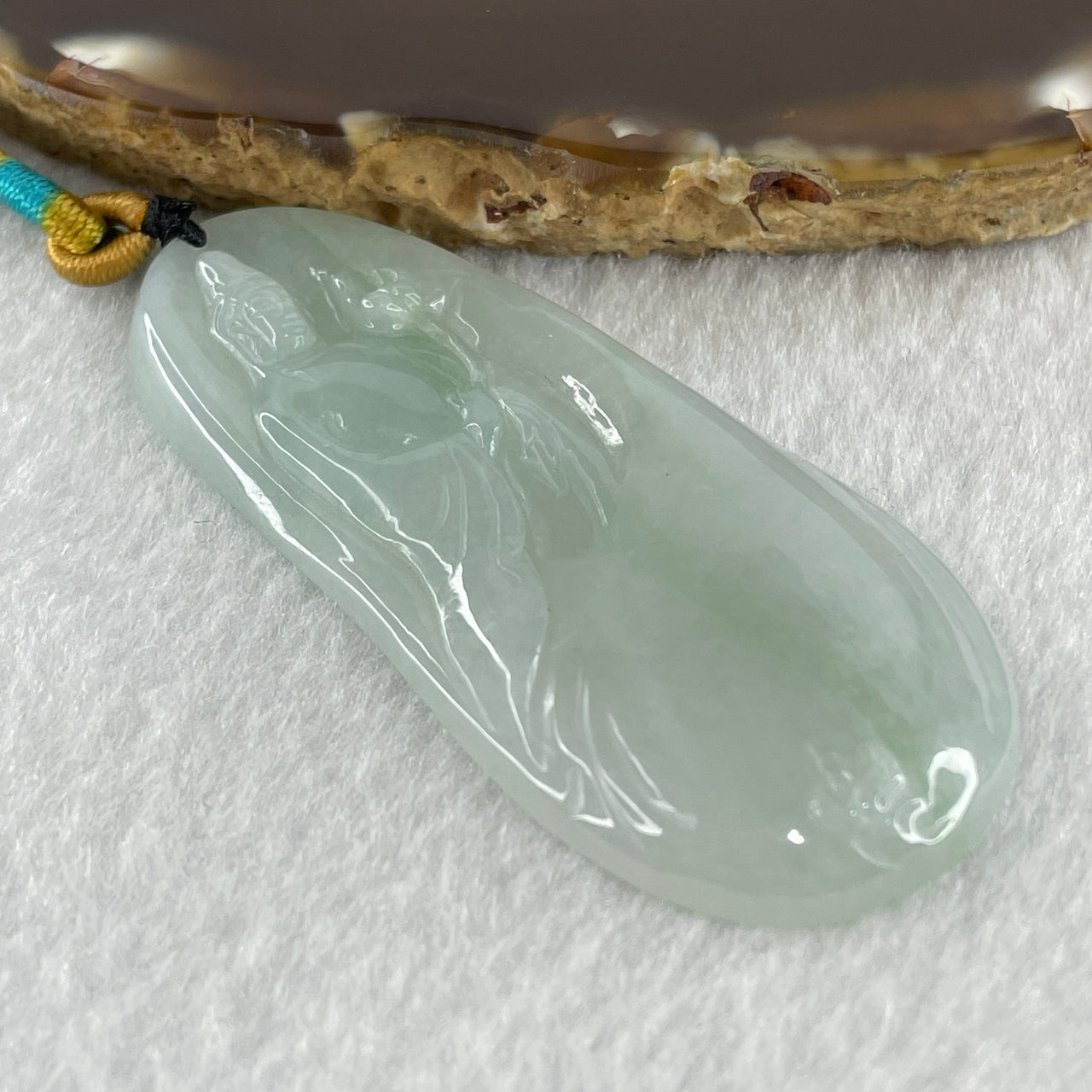 Natural Type A Semi Icy Faint Green Faint Lavender Guan Yin Jadeite Pendant 21.77g 62.6 by 27.9 by 5.8mm
