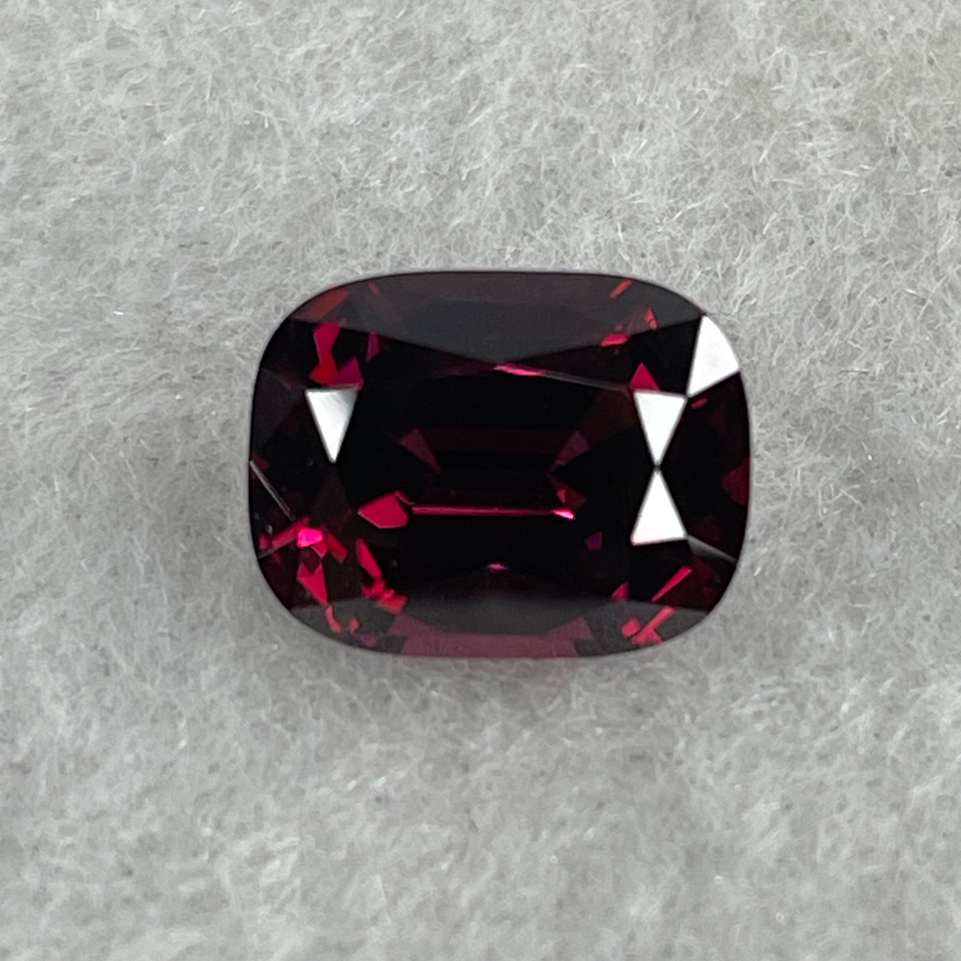 Natural Red Rhodolite Garnet Stone for Setting Cushion, brilliant/step cut 4.38cts 10.69 by 8.25 by 3.53mm NGI Cert No:32887346 - Huangs Jadeite and Jewelry Pte Ltd