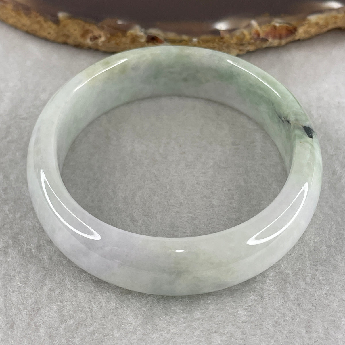 Natural Type A Light Lavender with Green Jadeite Oval Bangle 50.92g Inner Diameter 57.2mm 14.3 by 7.2mm (Slight External Rough) - Huangs Jadeite and Jewelry Pte Ltd