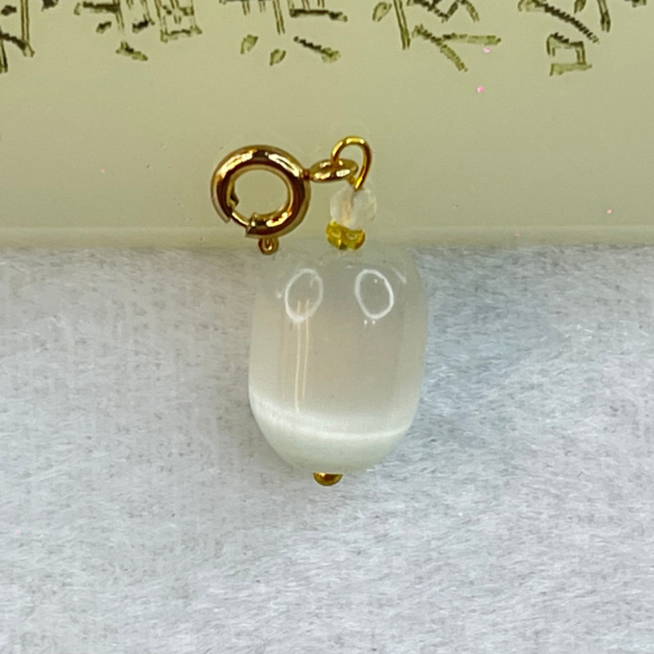 White Cat's Eye Glass Charm Pendent 2.63g 13.3 by 10.4mm - Huangs Jadeite and Jewelry Pte Ltd