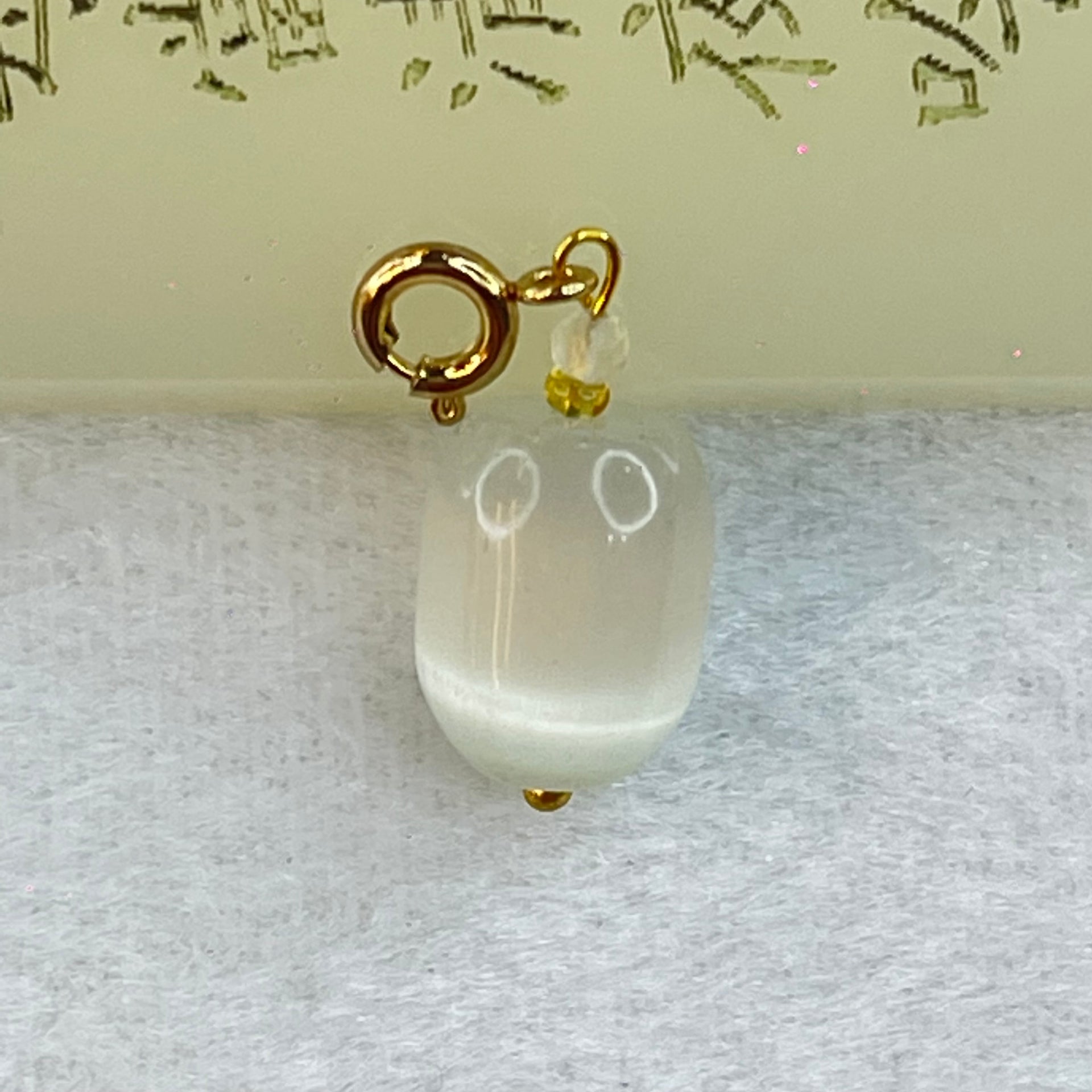 White Cat's Eye Glass Charm Pendent 2.63g 13.3 by 10.4mm - Huangs Jadeite and Jewelry Pte Ltd