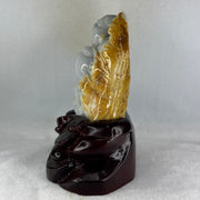 Type A Light Green with Faint Lavender and Yellow Jadeite Milo Buddha Display 170.0 by 100.0 by 190.0mm with wooden stand 2,574.1g - Huangs Jadeite and Jewelry Pte Ltd