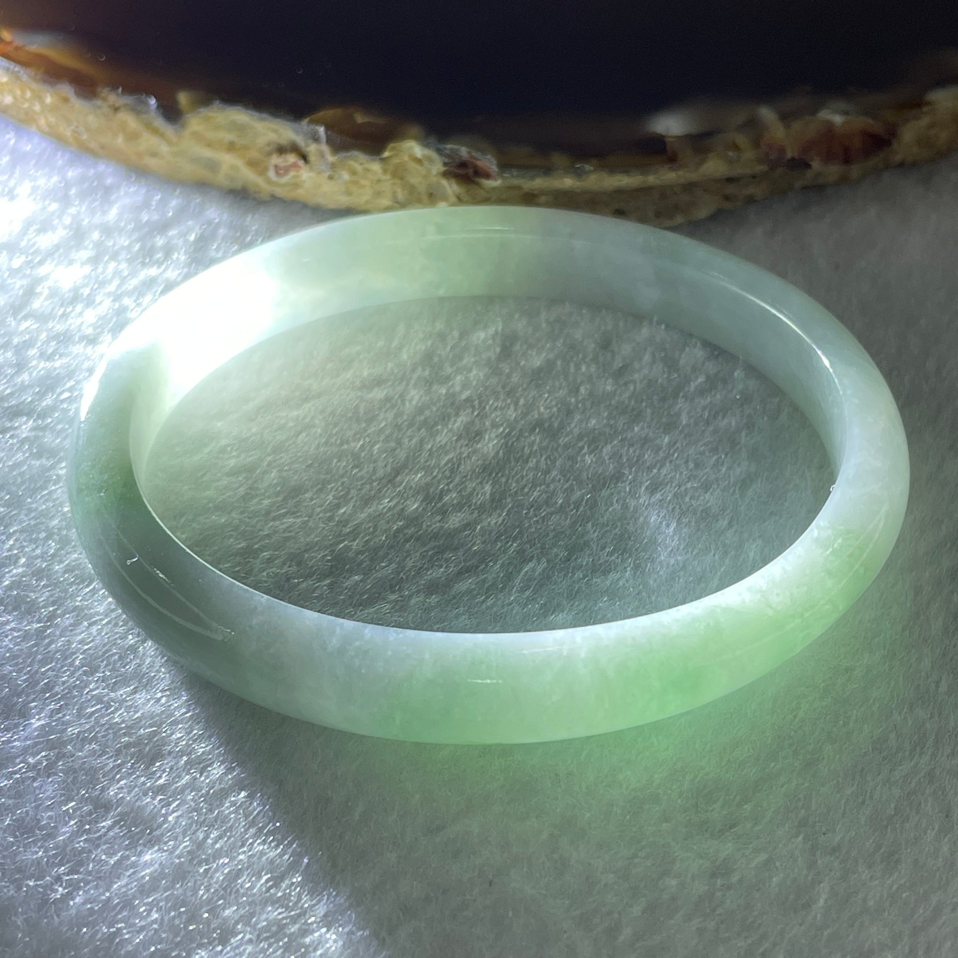 Certified Type A Light Green with Green Patches Jadeite Oval Bangle Internal Diameter 54.3mm 20.69g 7.5 by 6.4mm ( Very Slight Internal Lines ) - Huangs Jadeite and Jewelry Pte Ltd