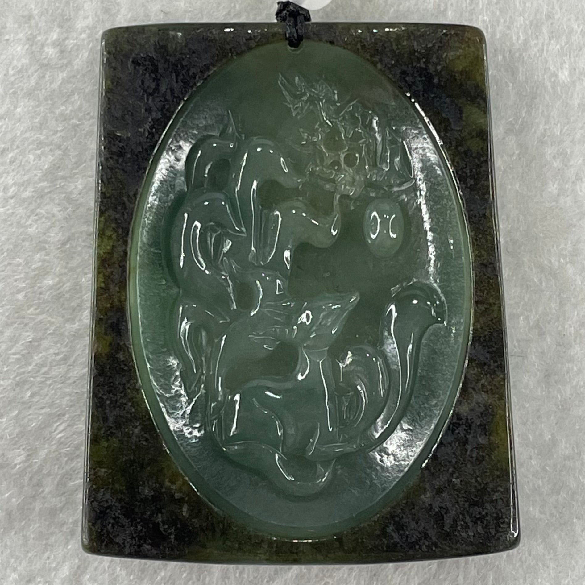 Grand Master Type A Blueish Green with Dark Brown Skin Jadeite 9 Tail Fox Pendant 41.48g 53.5 by 42.3 by 9.8mm - Huangs Jadeite and Jewelry Pte Ltd