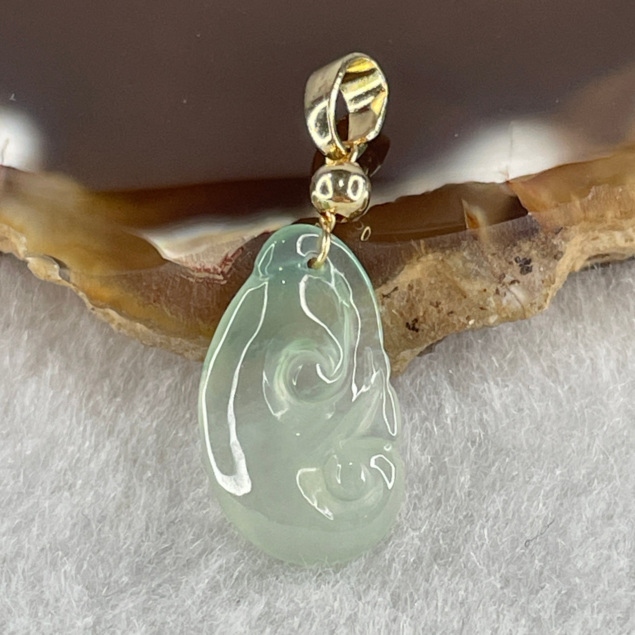 Type A Icy Green with Faint Green Jadeite Ruyi Pendant 0.85g 16.2 by 9.5 by 2.6mm - Huangs Jadeite and Jewelry Pte Ltd