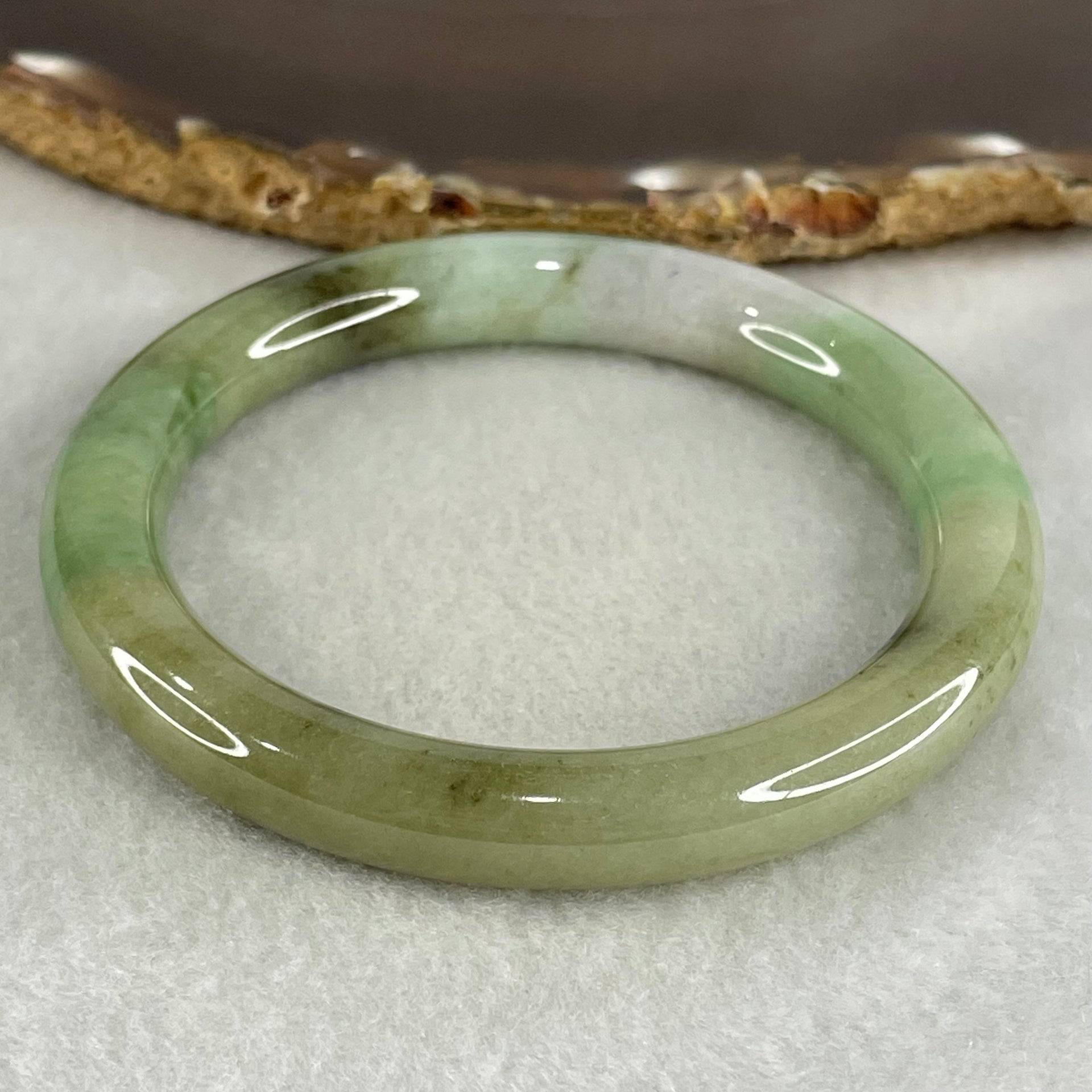 Type A Light Green with Green piao Hua Floral Jadeite Bangle 49.37g Inner Diameter 57.7mm 19.6 by 9.8mm (Very Slight Internal Lines) - Huangs Jadeite and Jewelry Pte Ltd