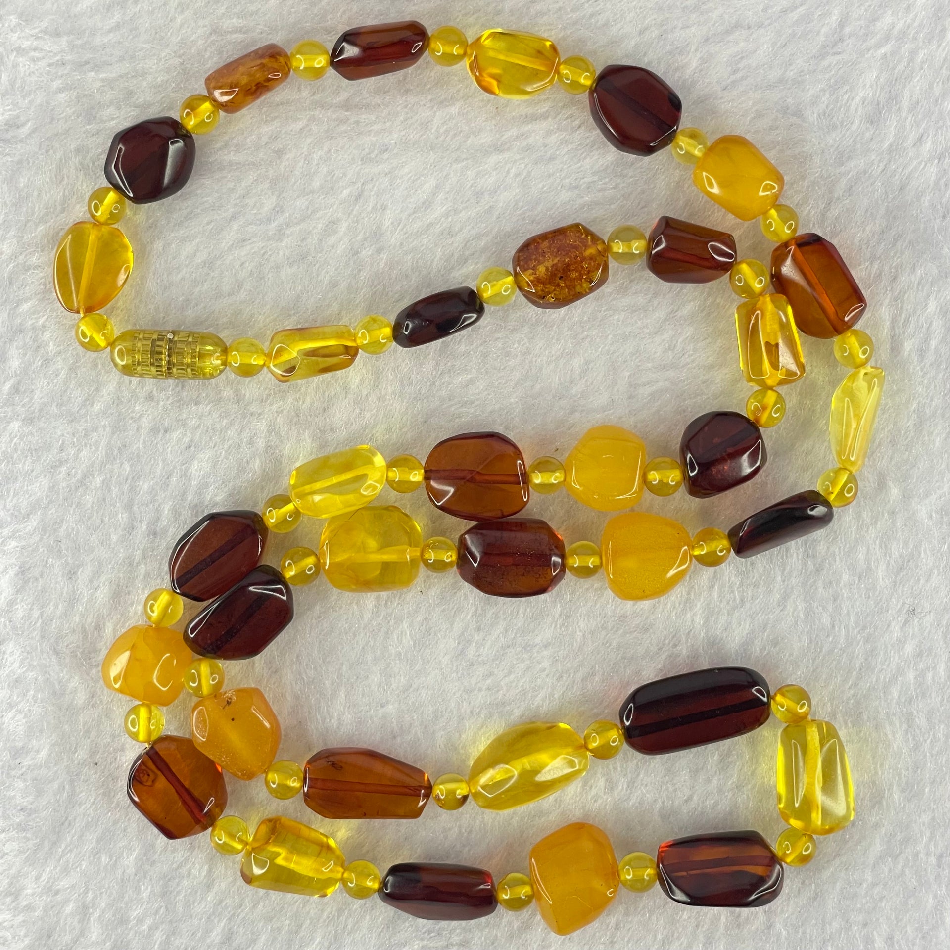 Natural Mixed Color Amber Beads Necklaces 18.16g 60cm 18.8 by 10.2 by 4.8mm, 11.2 by 7.1 by 5.5mm 35pcs - Huangs Jadeite and Jewelry Pte Ltd