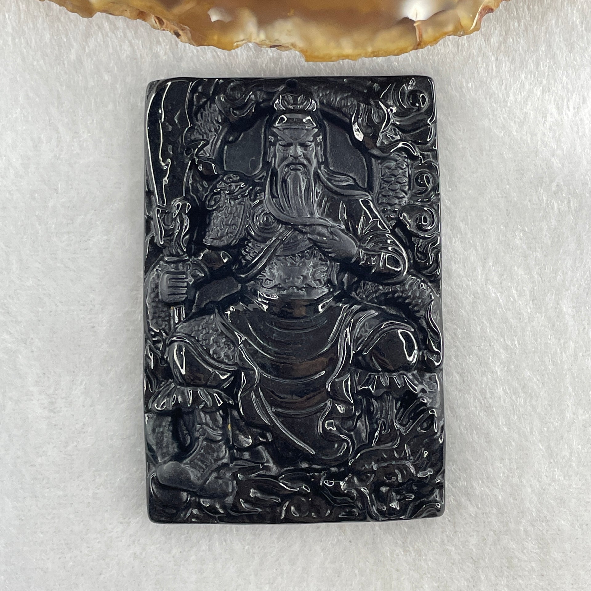 Type A Opaque to Partial Translucent Black Omphacite Jadeite Guan Gong with Dragon Pendant 33.76g 61.3 by 41.6 by 7.2mm - Huangs Jadeite and Jewelry Pte Ltd