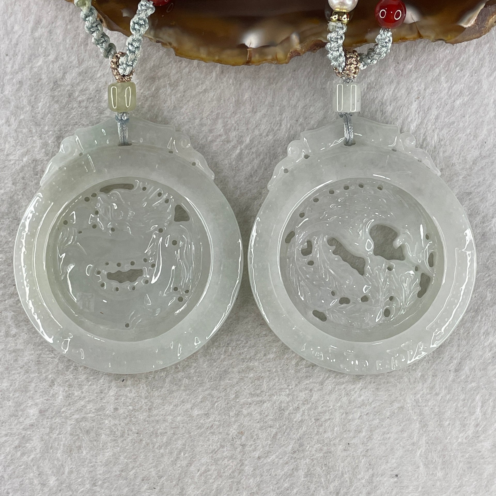 Grand Master Natural Colorless to Fain Green Jadeite Dragon and Phoenix Pendant 60.88g 54.8 by 47.9 by 6.0mm - Huangs Jadeite and Jewelry Pte Ltd