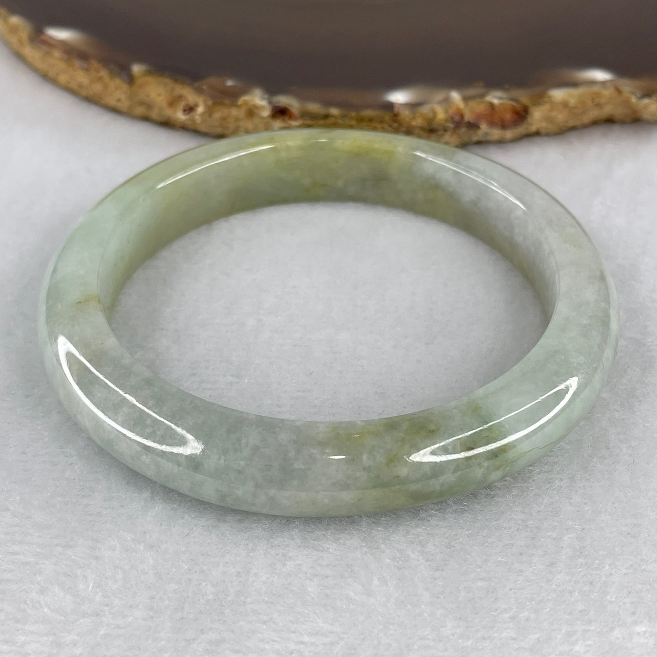 Certified Natural Type A Light Green with Yellowish Jadeite Bangle 54.279g Internal Diameter 57.8mm 11.2 by 9.5mm (Slight Internal Lines)