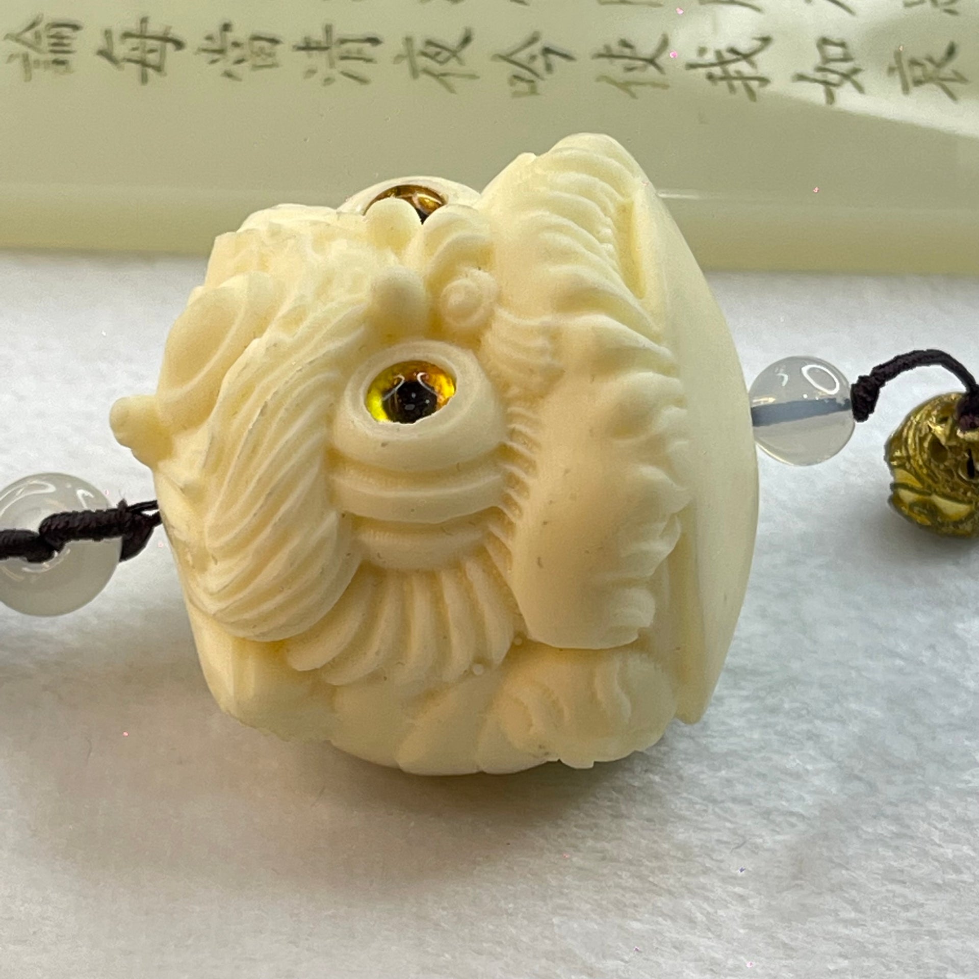 Ivory Fruit Seed Fu Gou Head Display 72.68g 43.1 by 47.0 by 41.7mm - Huangs Jadeite and Jewelry Pte Ltd
