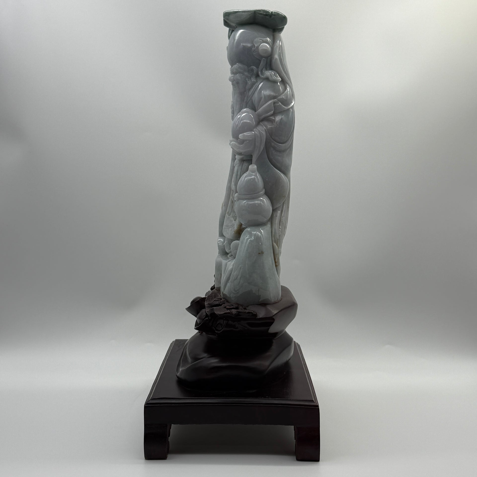 Type A Lavender, Green & Yellow Jade Jadeite Shou Xing Gong with Wooden Stand 财源滚滚 健康长寿 - 3.93kg Dimensions with Stand: 39 by 25 by 15cm Jade Dimensions: 27 by 15 by 7cm - Huangs Jadeite and Jewelry Pte Ltd