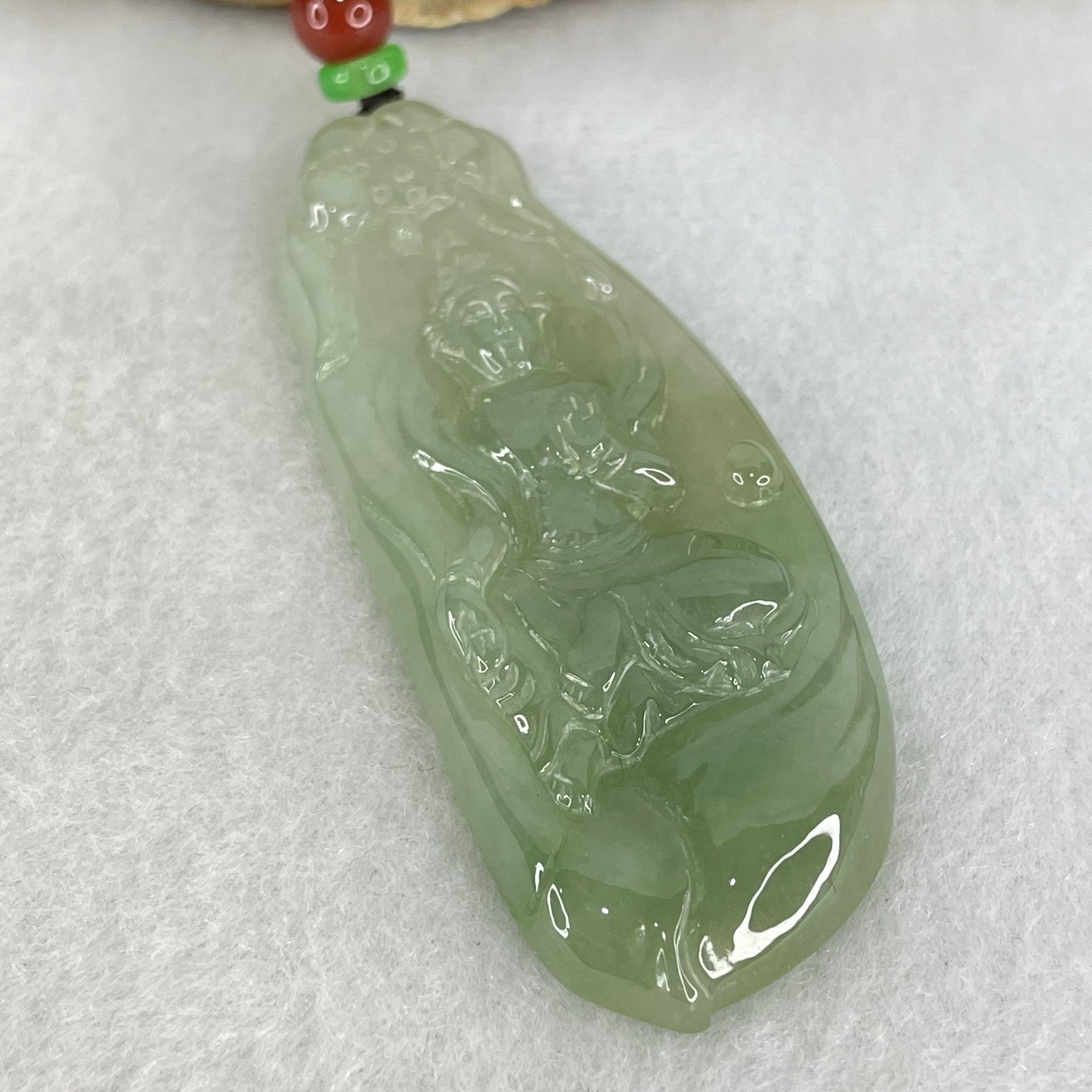 Type A Semi Icy Light Blueish Green Jadeite Guan Yin Pendant 20.29g 62.4 by 25.2 by 6.3mm - Huangs Jadeite and Jewelry Pte Ltd