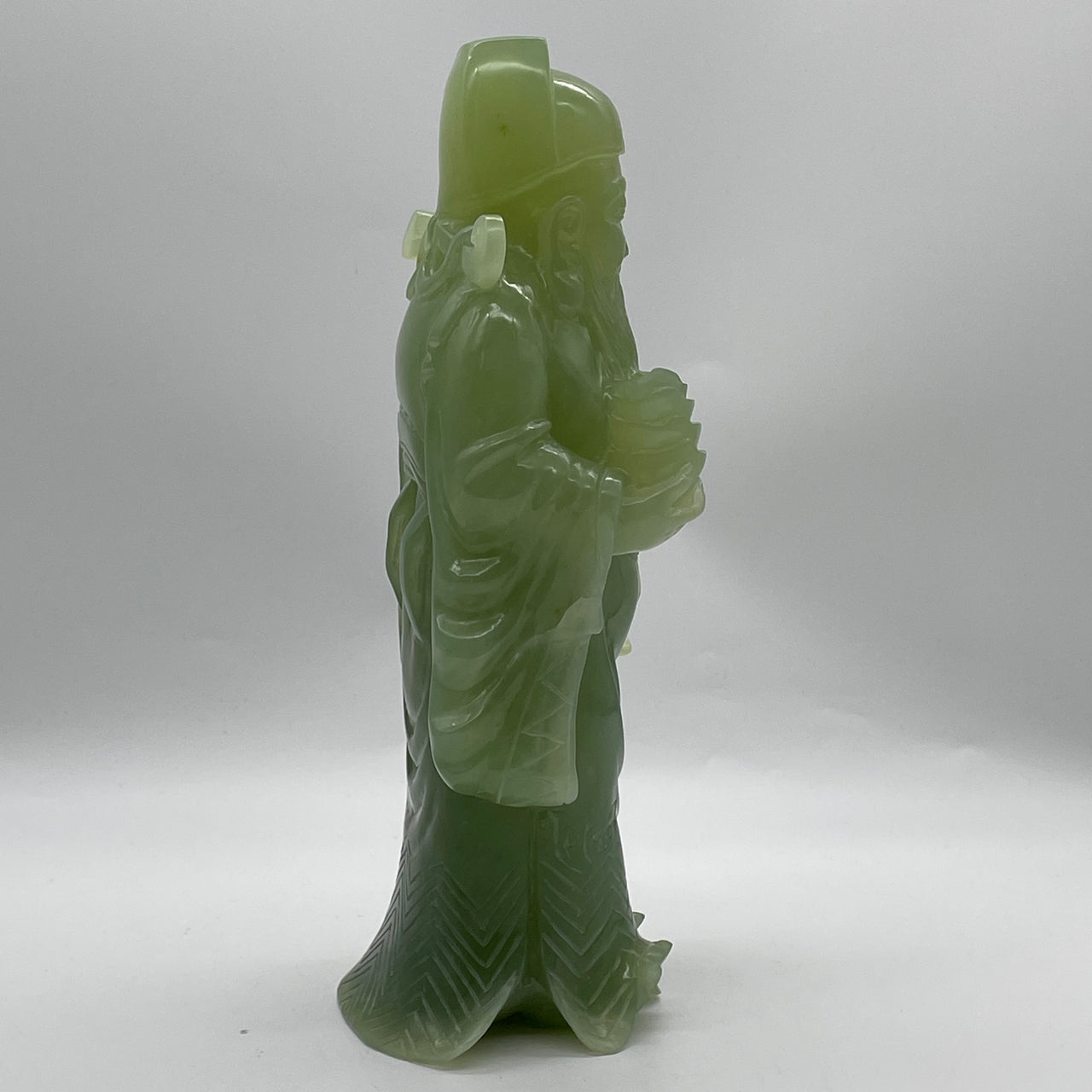 Natural Jelly Green Serpentine Cai Shen Ye God of Fortune with Ruyi Display 2,379.1g 116.5 by 85.0 by 255.0mm