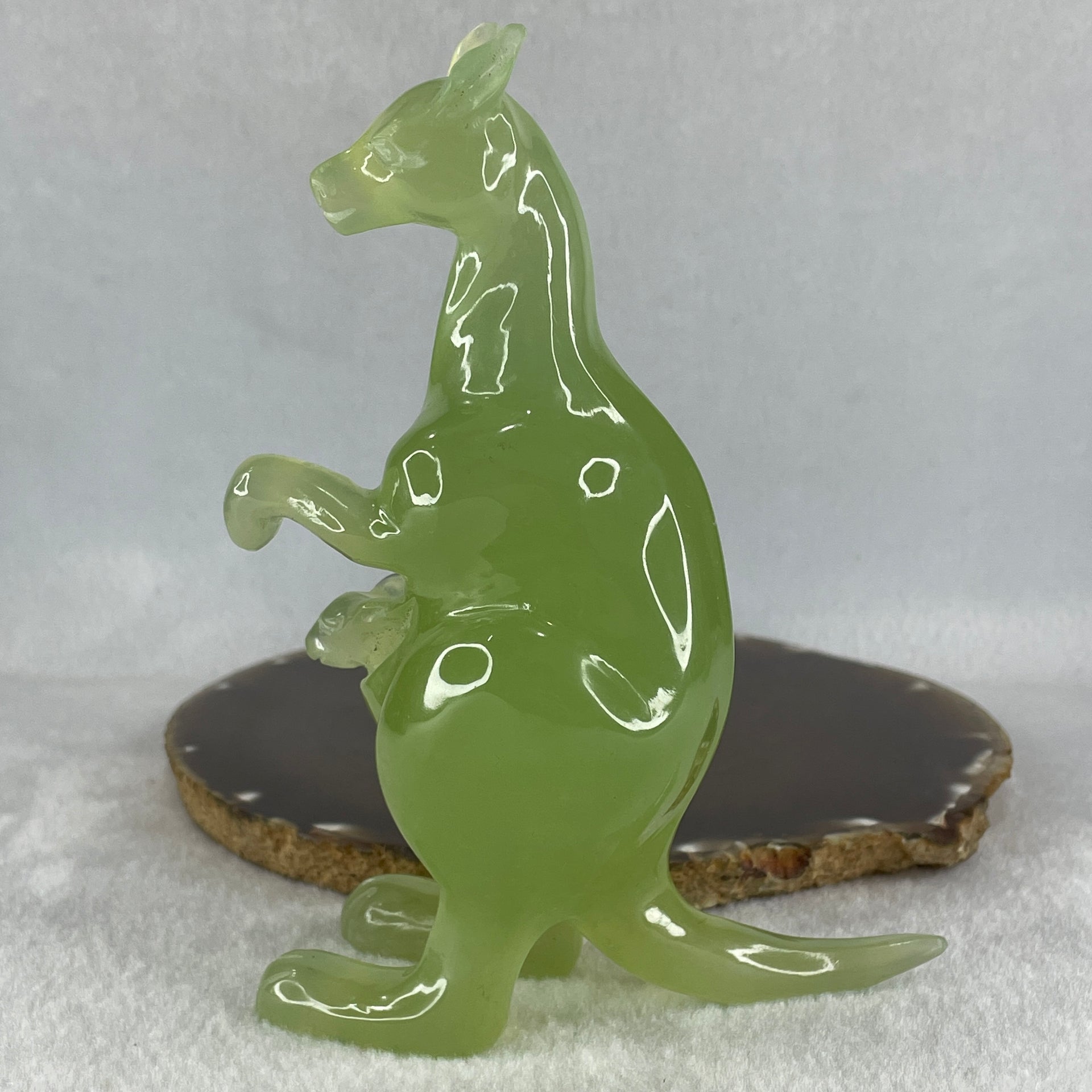 Natural Green Serpentine Kangaroo with Baby with Wooden Stand Display 382.2g 119.5 by 63.0 by 159.0mm - Huangs Jadeite and Jewelry Pte Ltd