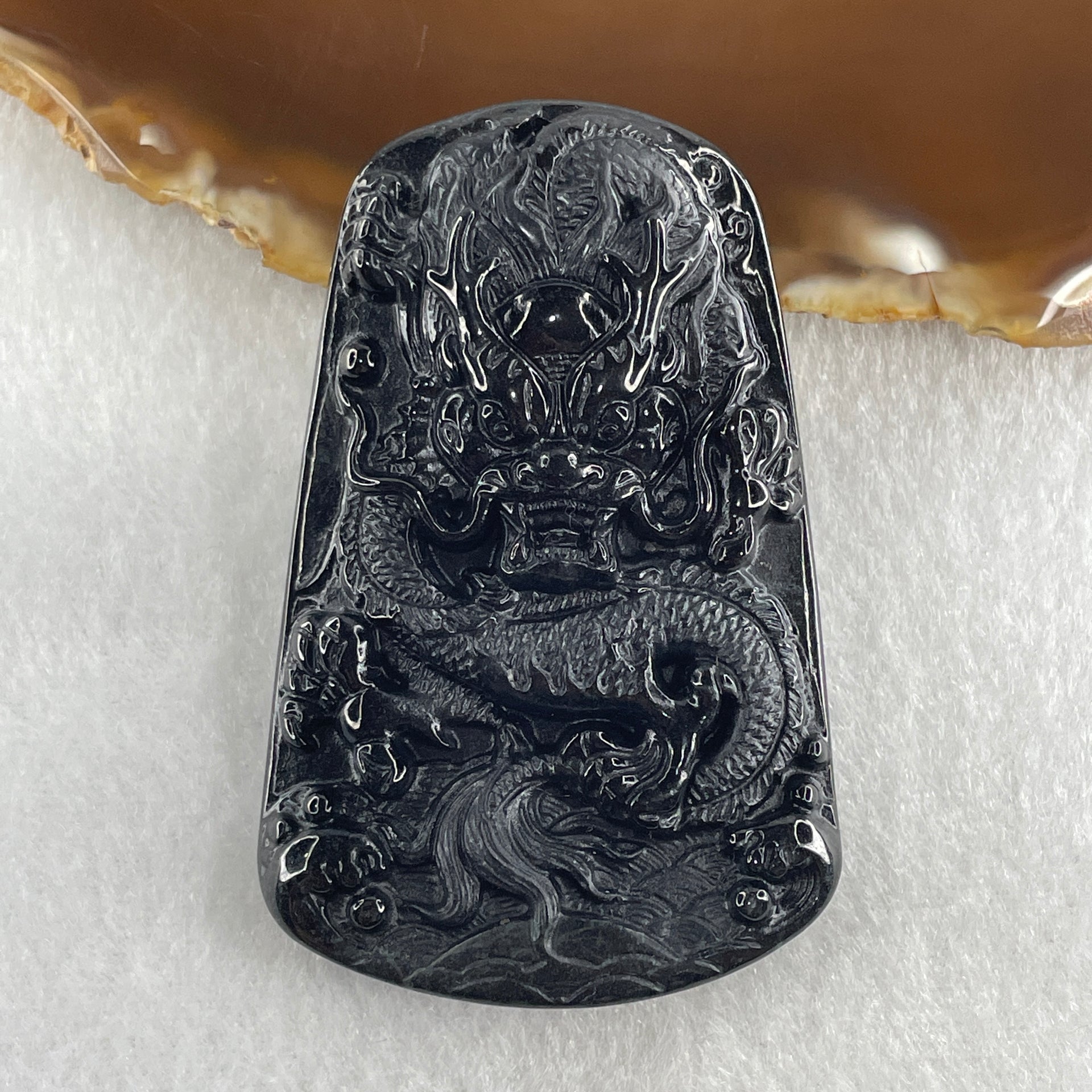 Type A Opaque to Partial Translucent Black Omphacite Jadeite Dragon Pendant 32.91g 66.0 by 42.2 by 9.5mm - Huangs Jadeite and Jewelry Pte Ltd