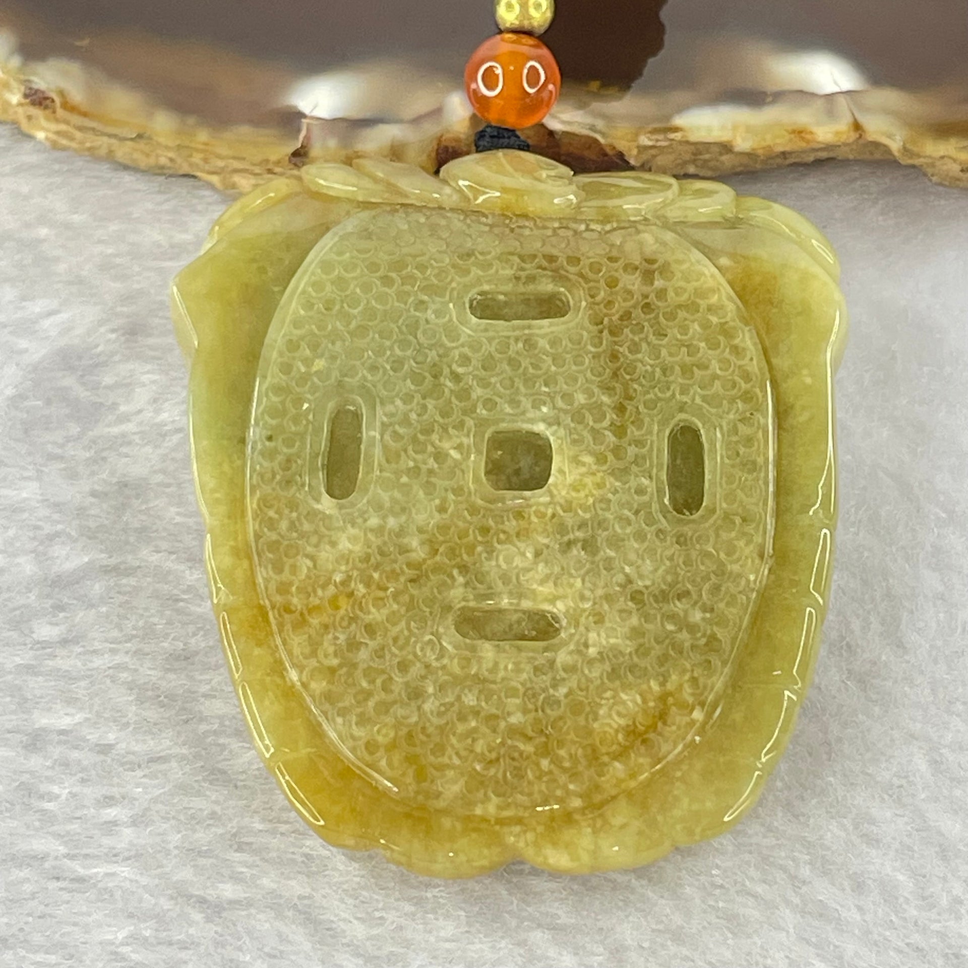 Type A Yellowish Brown Jadeite Tiger Head Pendent 48.59g 49.3 by 42.1 by 12.0mm - Huangs Jadeite and Jewelry Pte Ltd