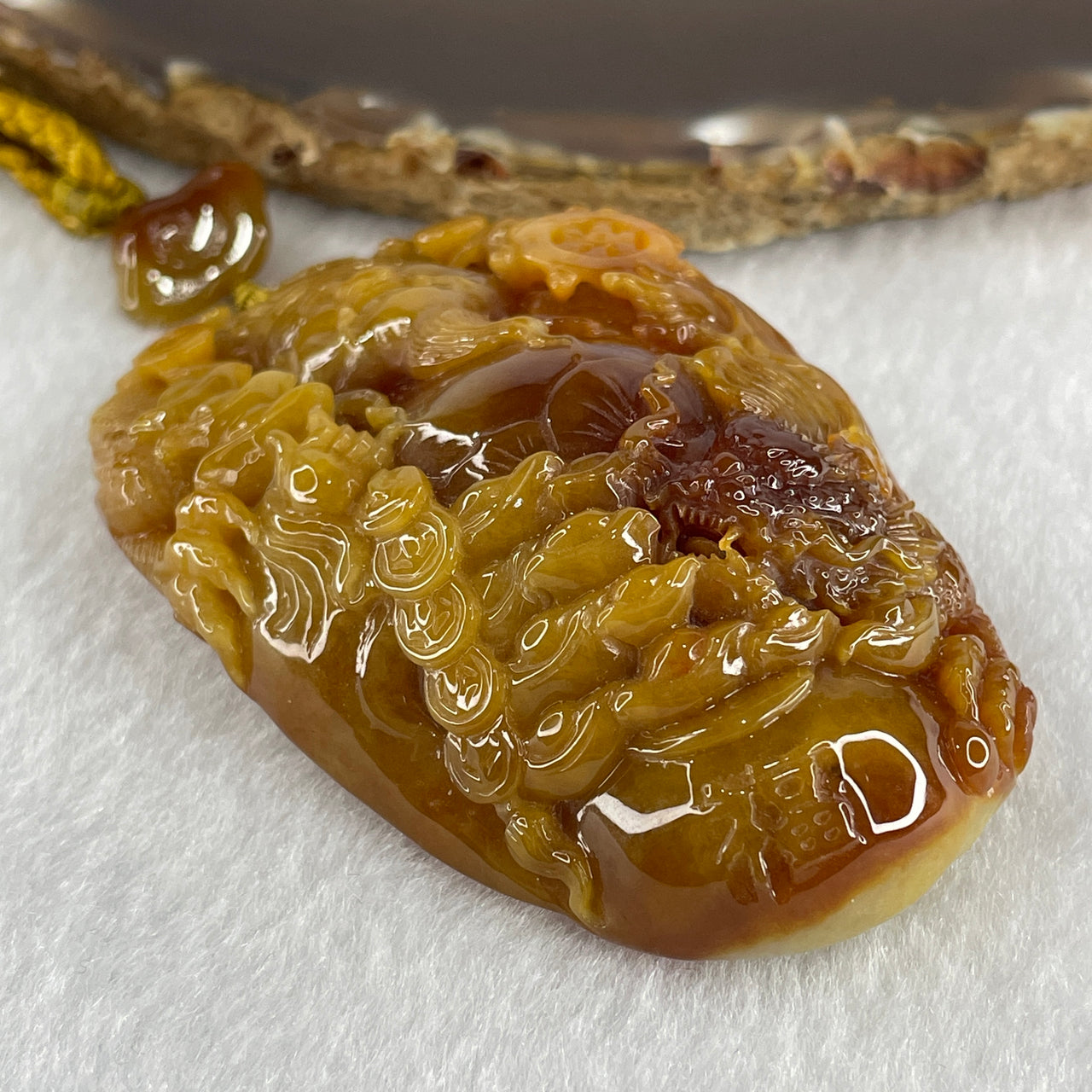 Grand Master Type A Yellowish with Brownish and Light Green Patches Jadeite Cai Shen Ye God Of Fortune with Dragon Double Side Pendant 117.78g 72.1 by 46.8 by 20.3mm