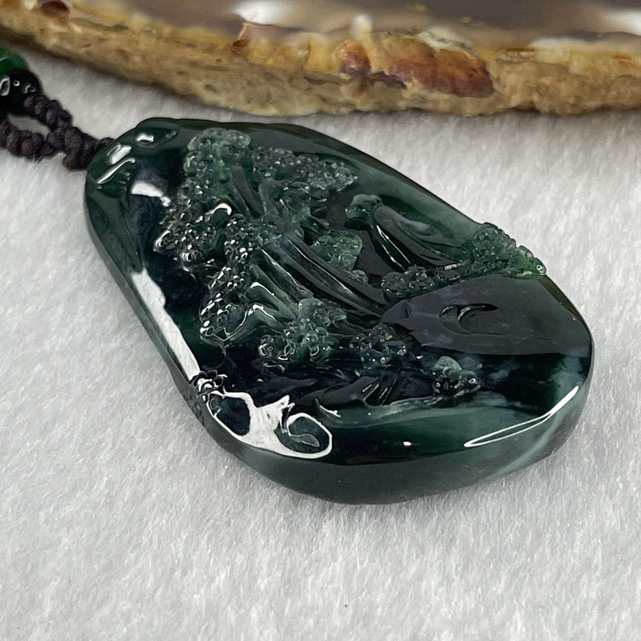 Grand Master Type A Icy Old Mine Spicy Green Jadeite Shan Shui with Gui Ren Double Side Pendant 22.57g 50.3 by 29.0 by 9.1mm