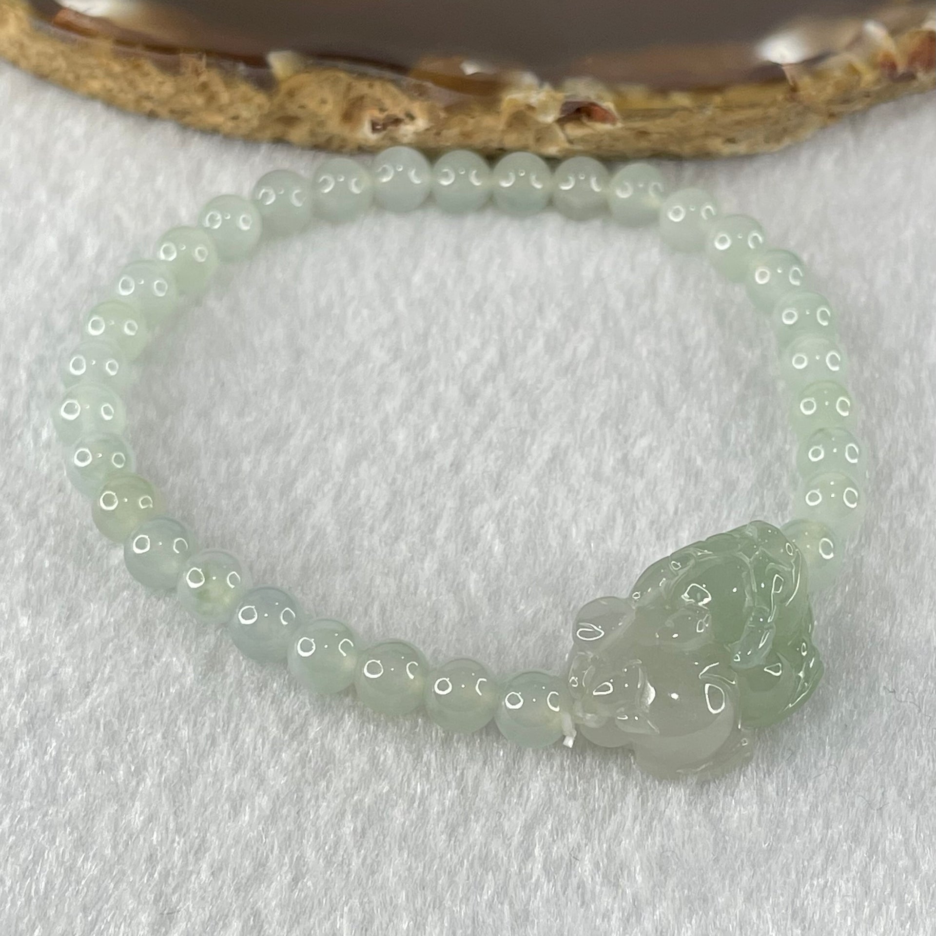 Type A Faint Blueish Green Jadeite Beads with Light Blueish Green Male Pixiu Charm Bracelet 12.93g 15.5cm 5.5cm 31 Beads 21.6 by 14.1 by 10.7mm - Huangs Jadeite and Jewelry Pte Ltd