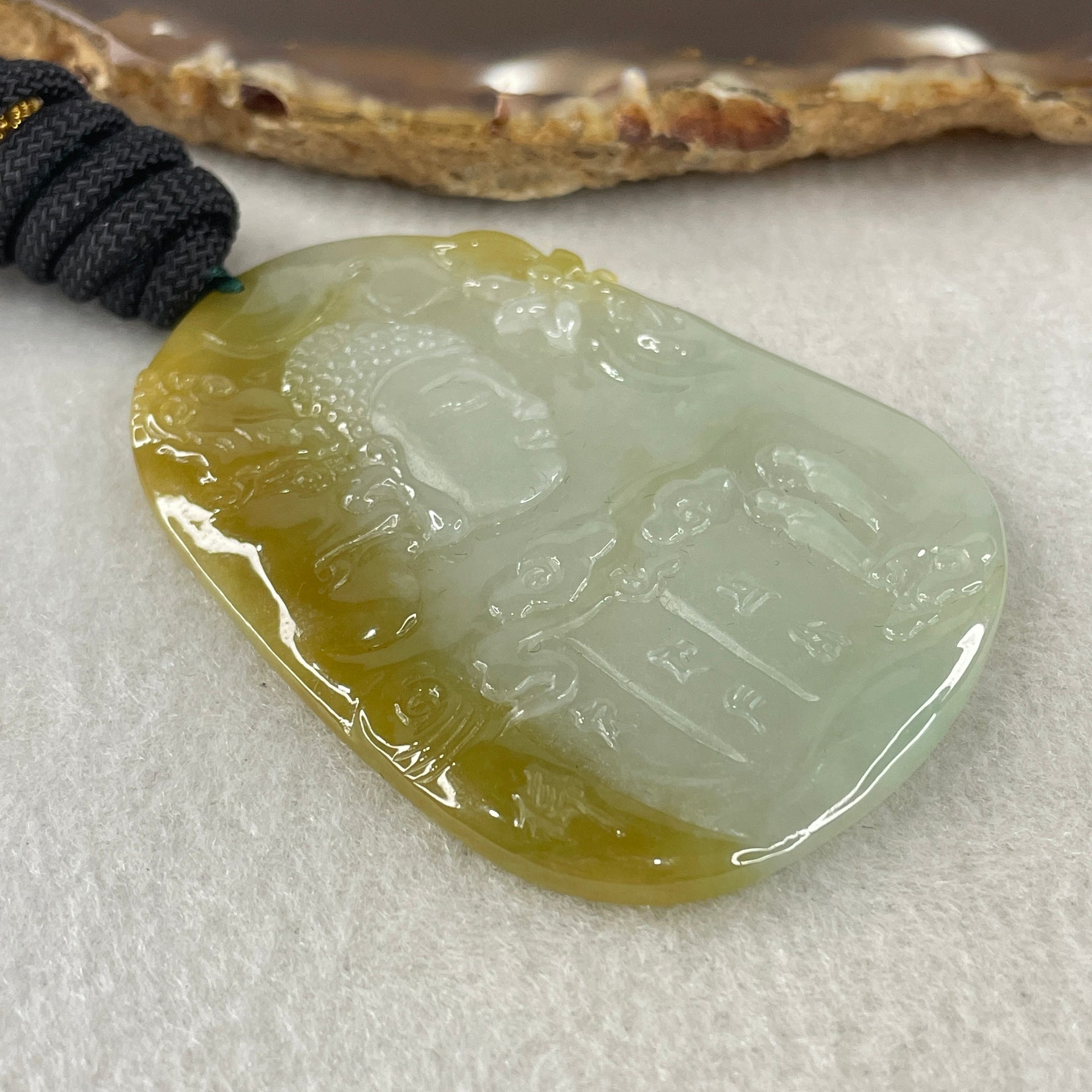 Grand Master Type A Faint Blueish Green with Yellowish Brown Jadeite Good Vs Evil Pendant 22.60g 60.3 by 43.3 by 4.0mm - Huangs Jadeite and Jewelry Pte Ltd