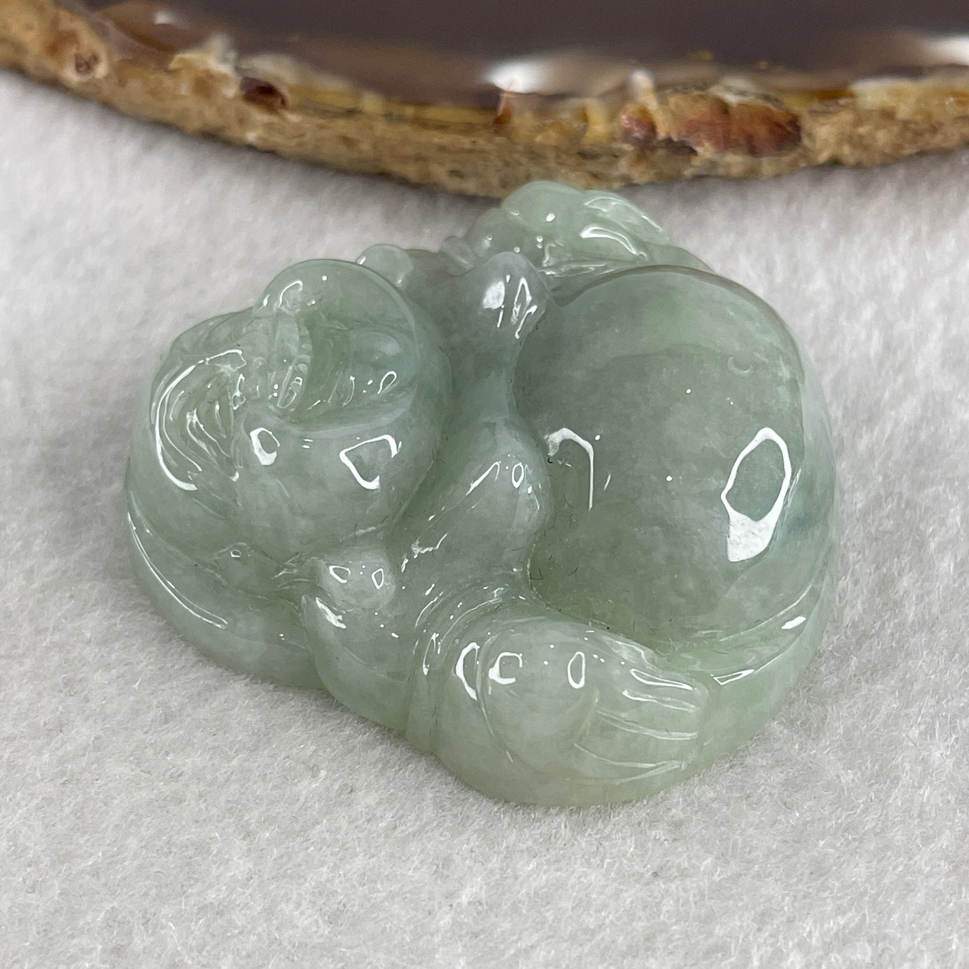Natural Type A Green Jadeite Milo Laughing Buddha Pendant 47.59g 46.1 by 48.7 by 14.6mm - Huangs Jadeite and Jewelry Pte Ltd