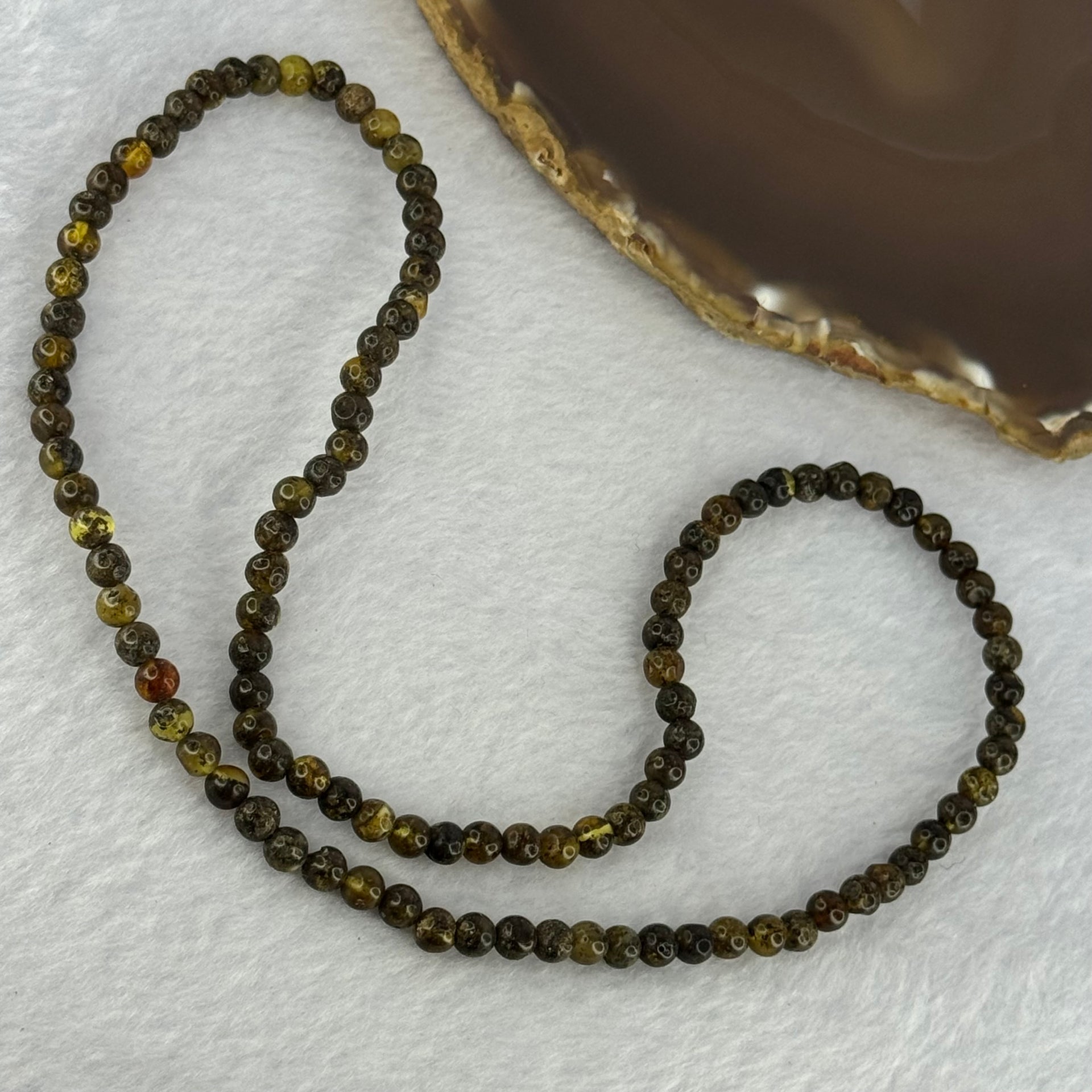 Natural Dark Brown Flower Amber Beads Elastic Necklace 8.02g 50cm 5.4mm 105 Beads - Huangs Jadeite and Jewelry Pte Ltd