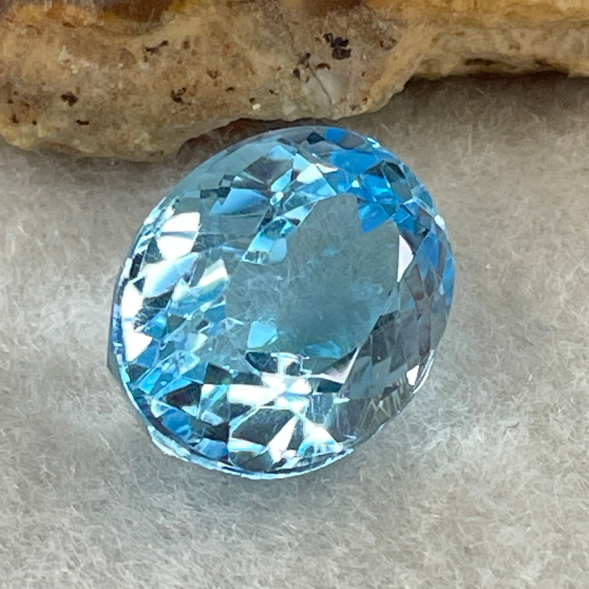 Natural Sky Blue Topaz Oval Shape 11.63ct 14.5 by 11.3 by 8.4mm - Huangs Jadeite and Jewelry Pte Ltd
