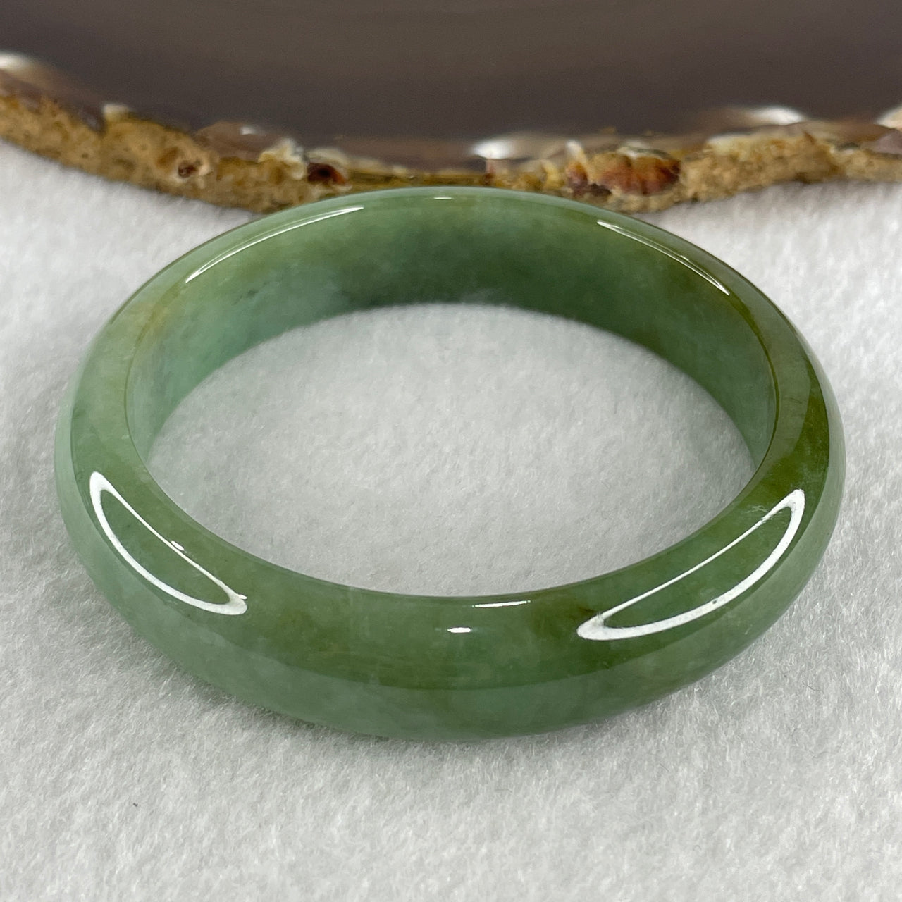 Type A Natural Jelly Green with Brownish Piao Hua Jadeite Bangle 49.14g Inner Diameter 57.2mm 13.1 by 7.3mm (Close to Perfect) - Huangs Jadeite and Jewelry Pte Ltd