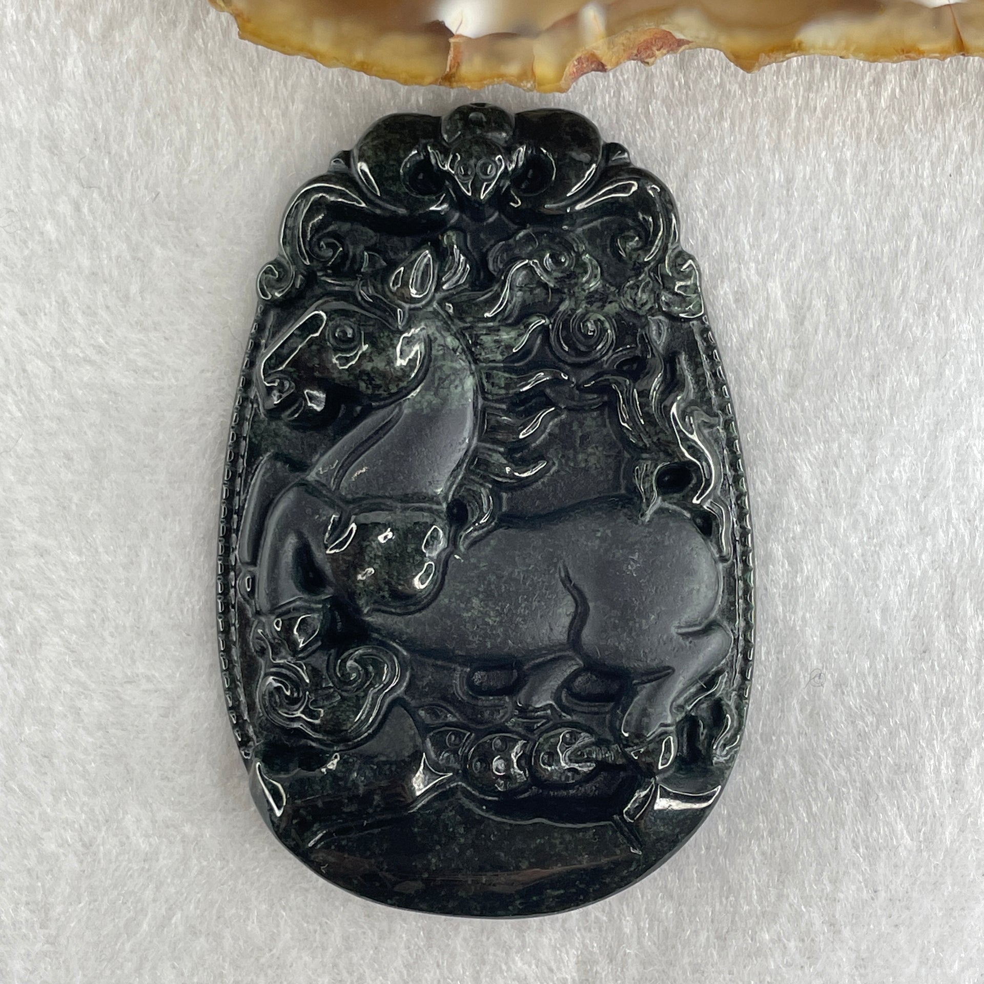 Type A Opaque to Partial Translucent Black Omphacite Jadeite Horse Pendant 26.34g 60.1 by 40.3 by 8.0mm - Huangs Jadeite and Jewelry Pte Ltd