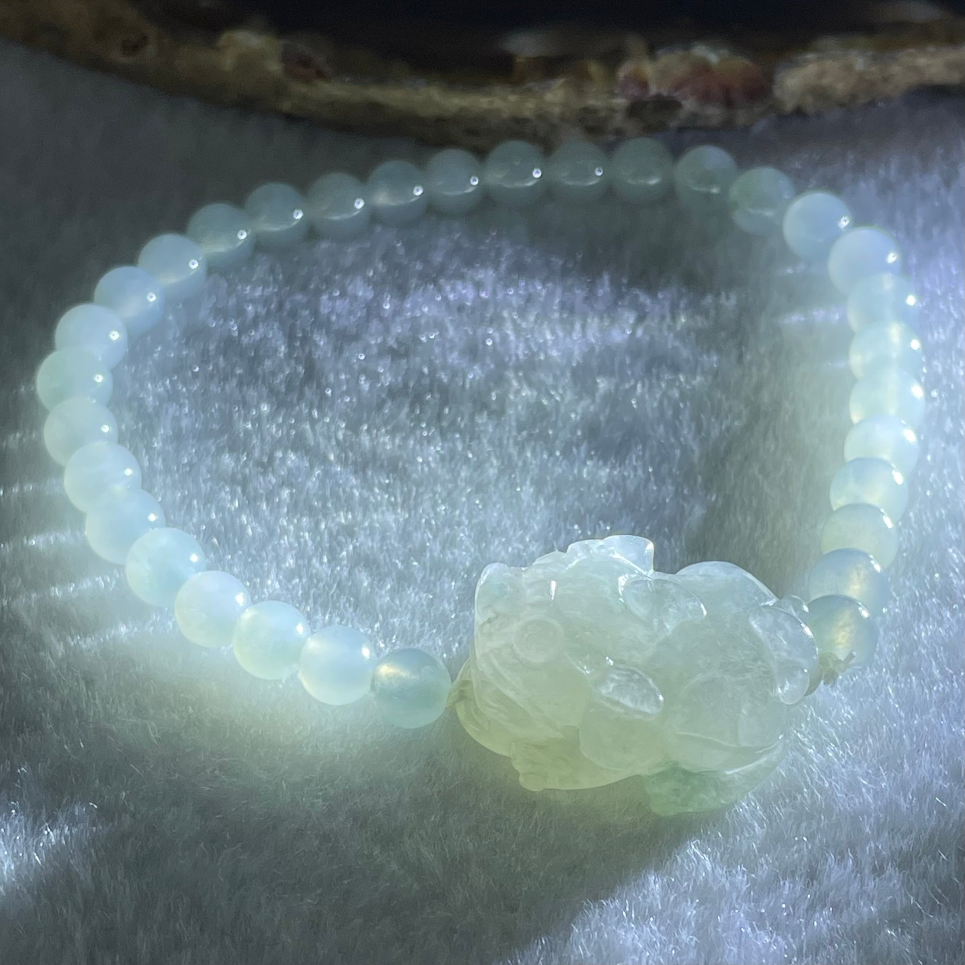 Special Type A Semi Icy Light Blueish Green Jadeite with Male Pixiu Charm Bracelet 5.61g 16cm 5.4mm 32 Beads 22.4 by 11.4 by 11.8mm 1pcs - Huangs Jadeite and Jewelry Pte Ltd