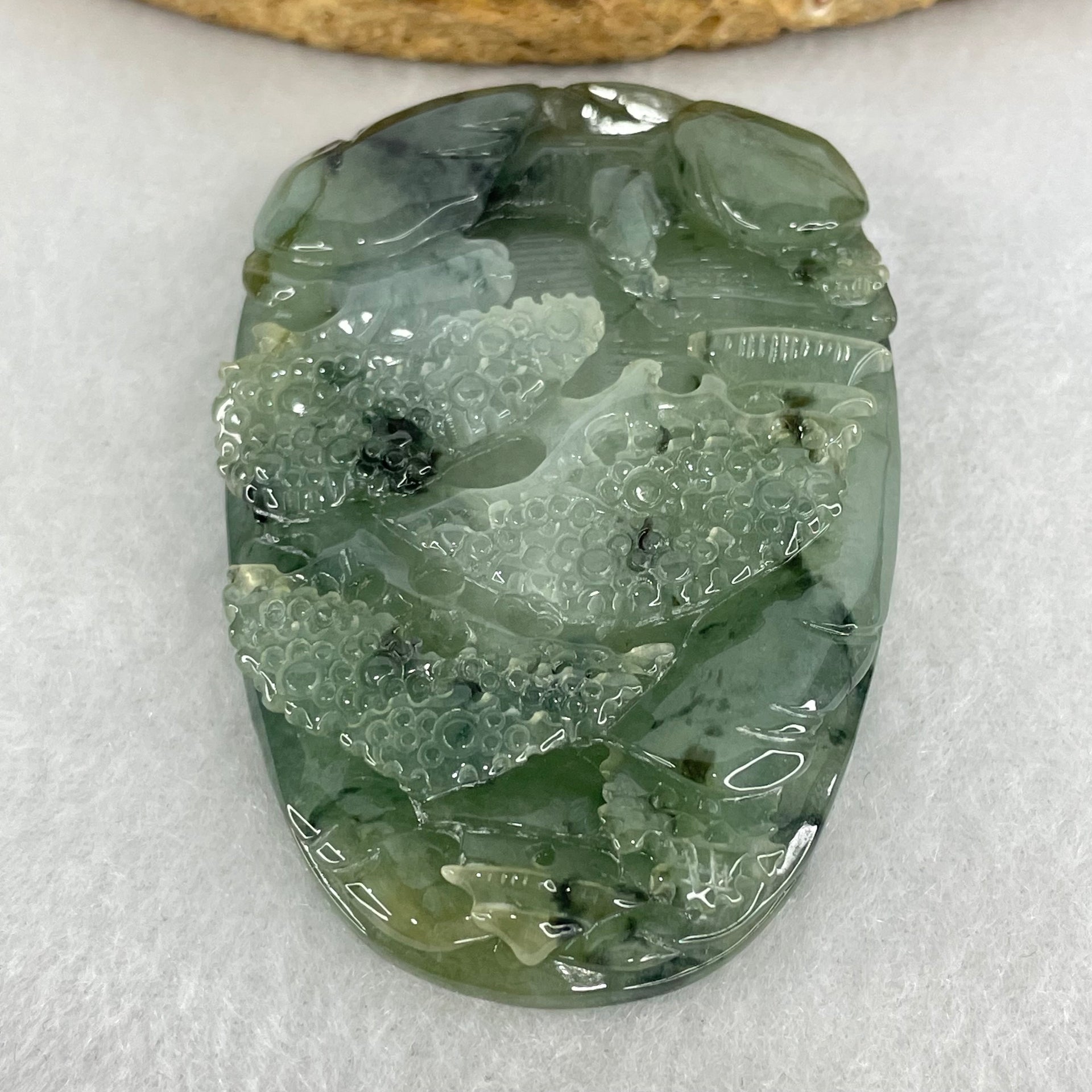 Type A Semi Icy Green with Dark Green Piao Hua Jadeite Shan Shui Gui Ren Benefactor Pendant 53.05g 59.6 by 40.3 by 10.7mm - Huangs Jadeite and Jewelry Pte Ltd