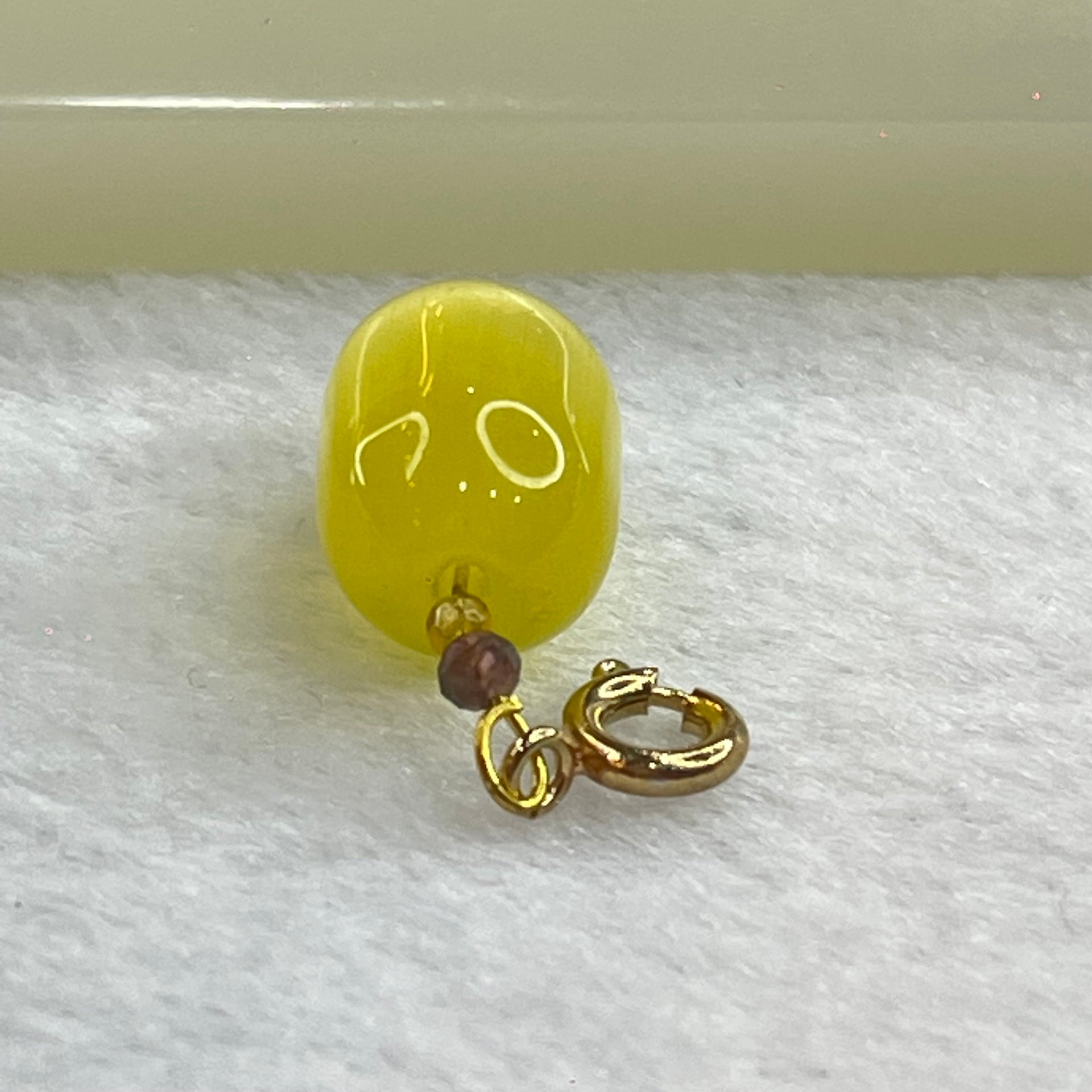 Yellow Cat's Eye Glass Charm Pendent 2.43g 14.4 by 10.0mm - Huangs Jadeite and Jewelry Pte Ltd