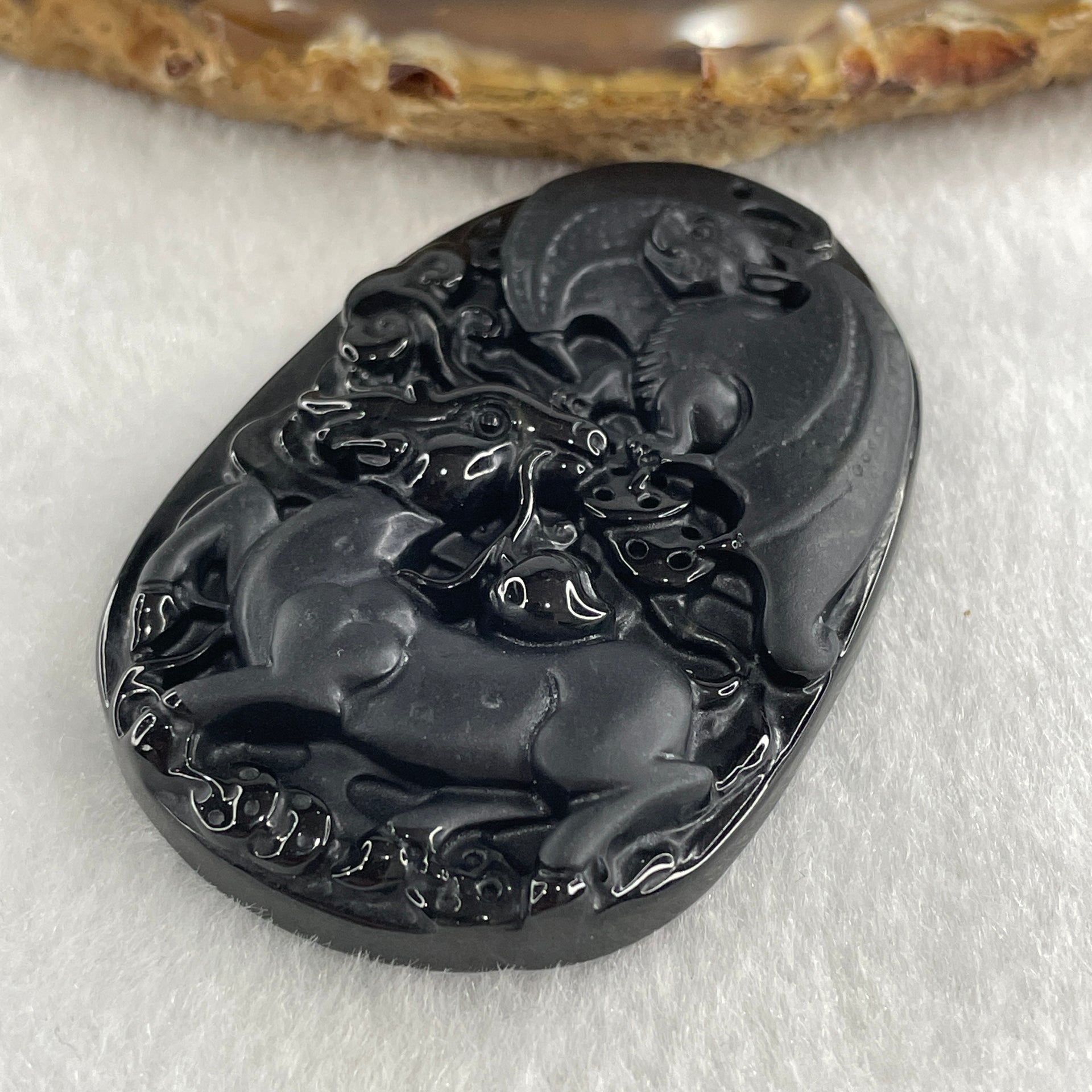 Type A Opaque to Partial Translucent Black Omphacite Jadeite Deer, Bat, Peach, Coins and Ruyi Pendant 27.95g 56.4 by 38.2 by 9.4mm - Huangs Jadeite and Jewelry Pte Ltd