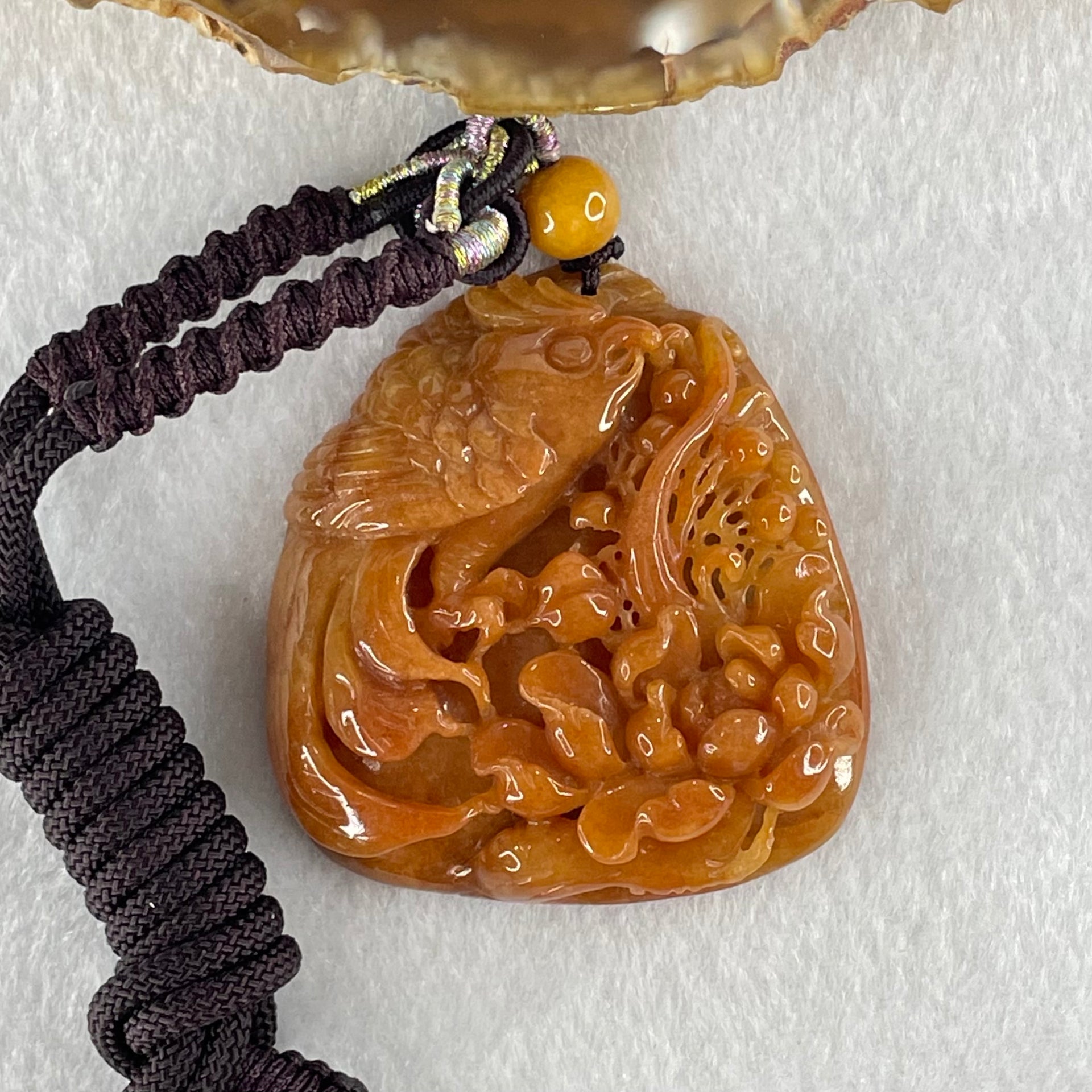 Grandmaster Type A Translucent Brownish Orange to Brownish Red with Light Blueish Green Jadeite Bird with Flower 花开富贵 Pendant 53.67g 49.27 by 46.37 by 12.66mm With NGI Cert 82838746 - Huangs Jadeite and Jewelry Pte Ltd
