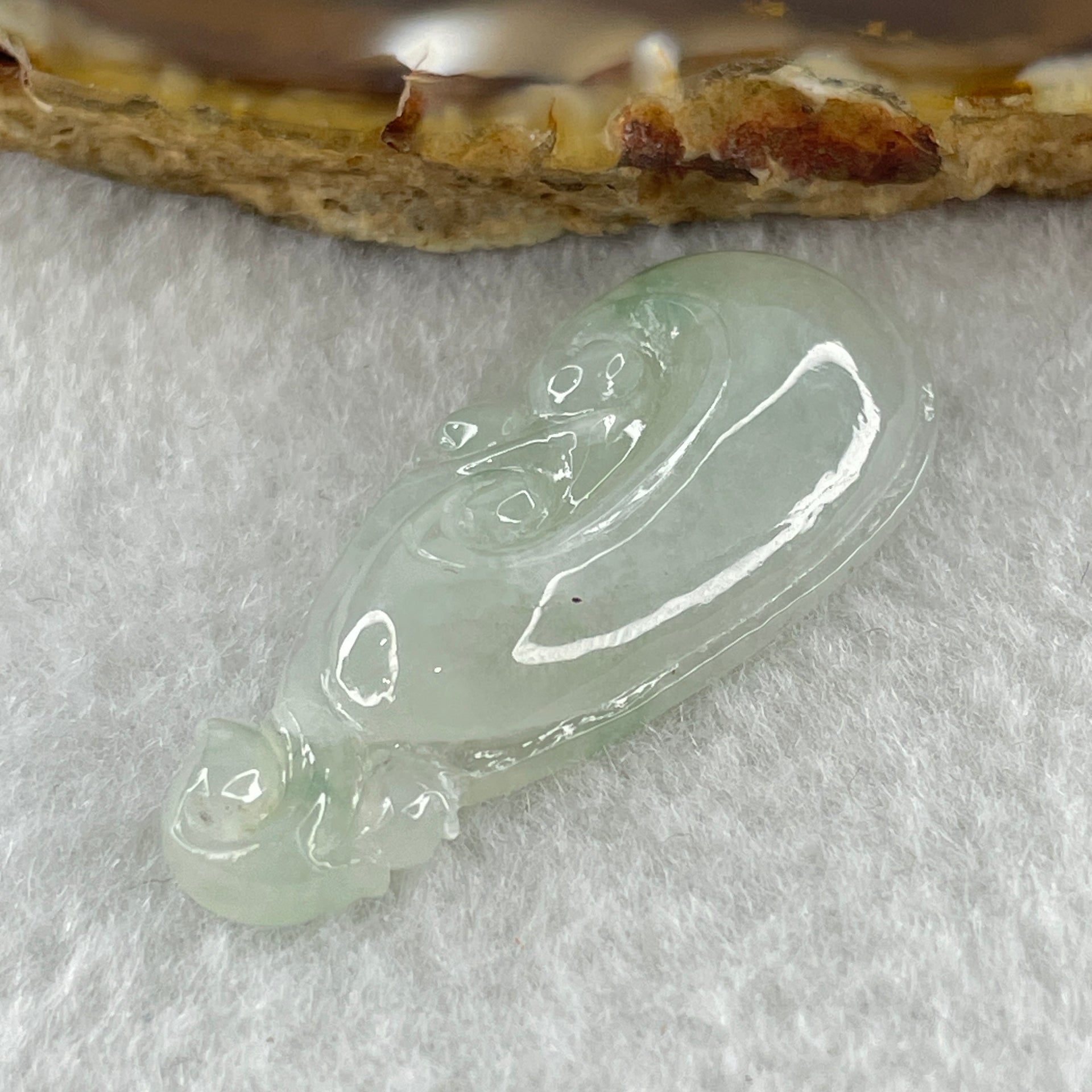 Type A Natural Semi Icy White to Faint Green with Green Patches Jadeite Ruyi Pendant 6.13g 39.5 by 17.3 by 6.7mm - Huangs Jadeite and Jewelry Pte Ltd