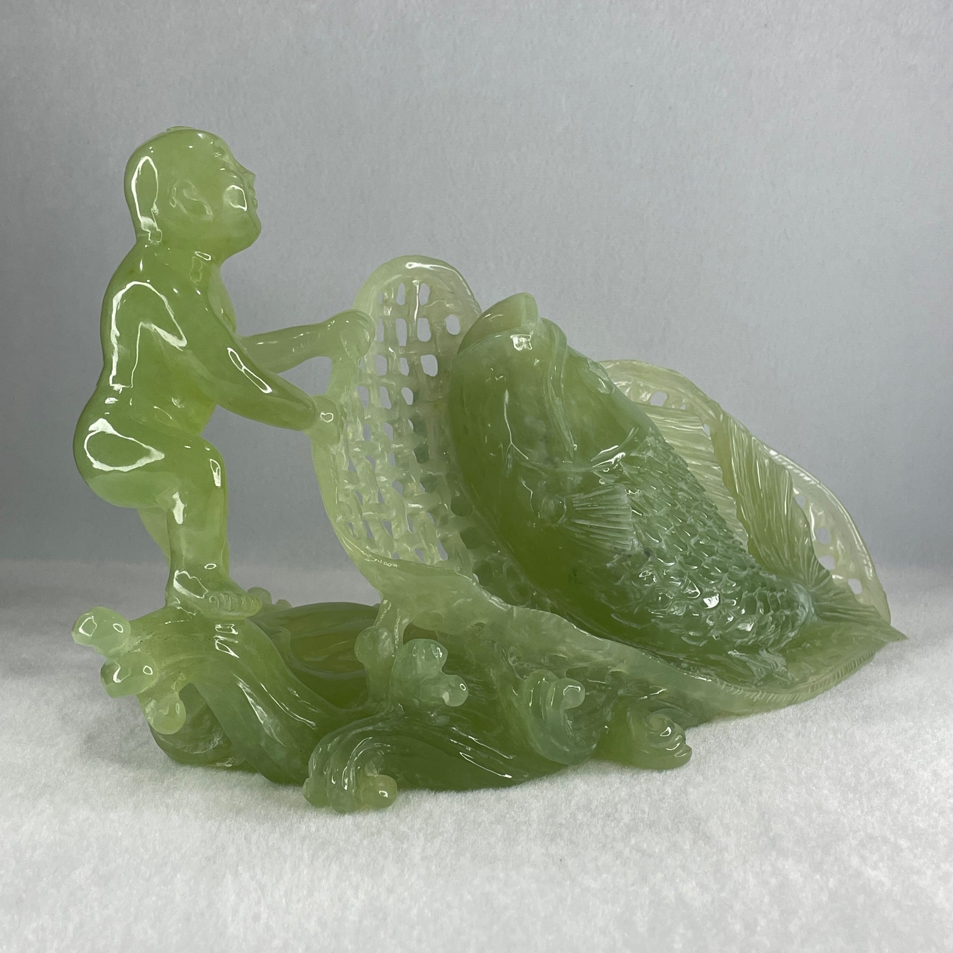 Natural Jelly Green Serpentine Tong Zhi Fishing Carp Fish Display 1,777.5g 285.0 by 150.0 by 160.0mm - Huangs Jadeite and Jewelry Pte Ltd
