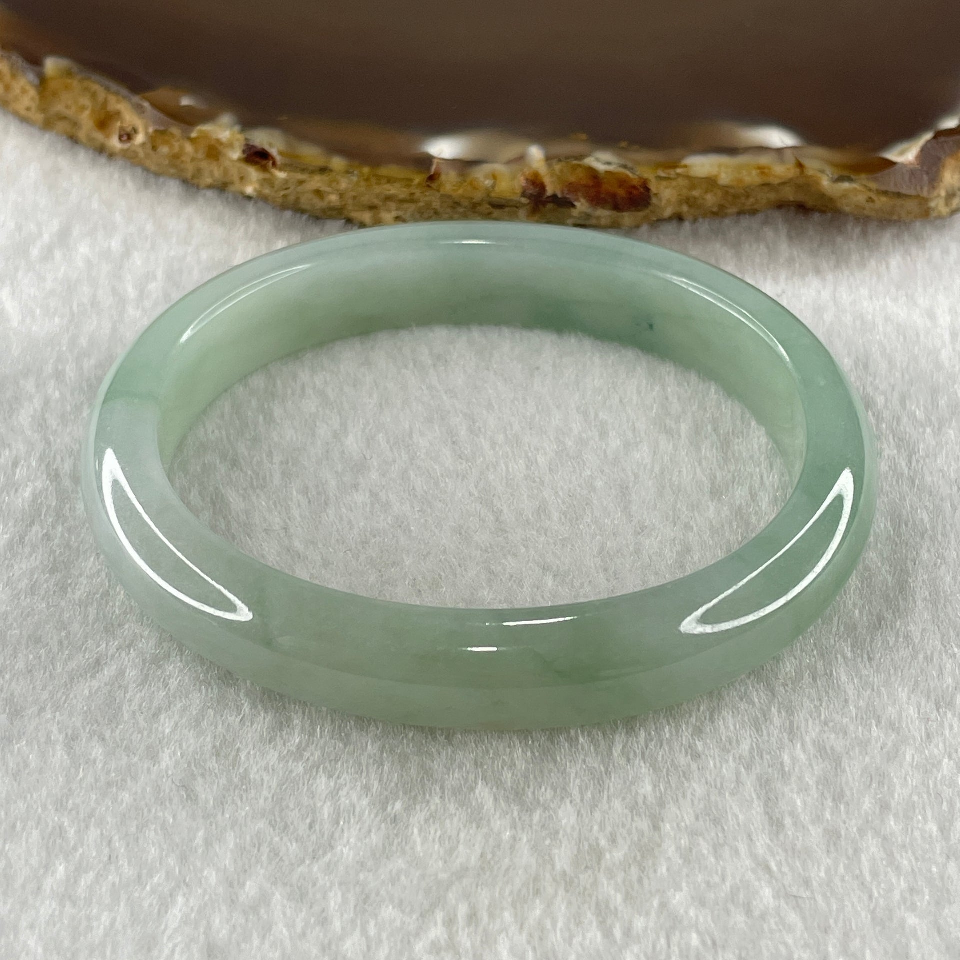 Natural Type A Jelly Full Light Green Jadeite Oval Bangle 34.07g Inner Diameter 53.8mm 10.2 by 7.4mm (Very Slight Internal Lines) - Huangs Jadeite and Jewelry Pte Ltd