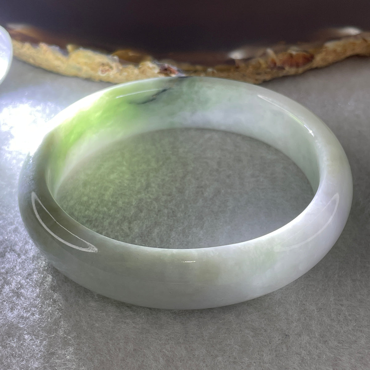 Natural Type A Light Lavender with Green Jadeite Oval Bangle 50.92g Inner Diameter 57.2mm 14.3 by 7.2mm (Slight External Rough) - Huangs Jadeite and Jewelry Pte Ltd