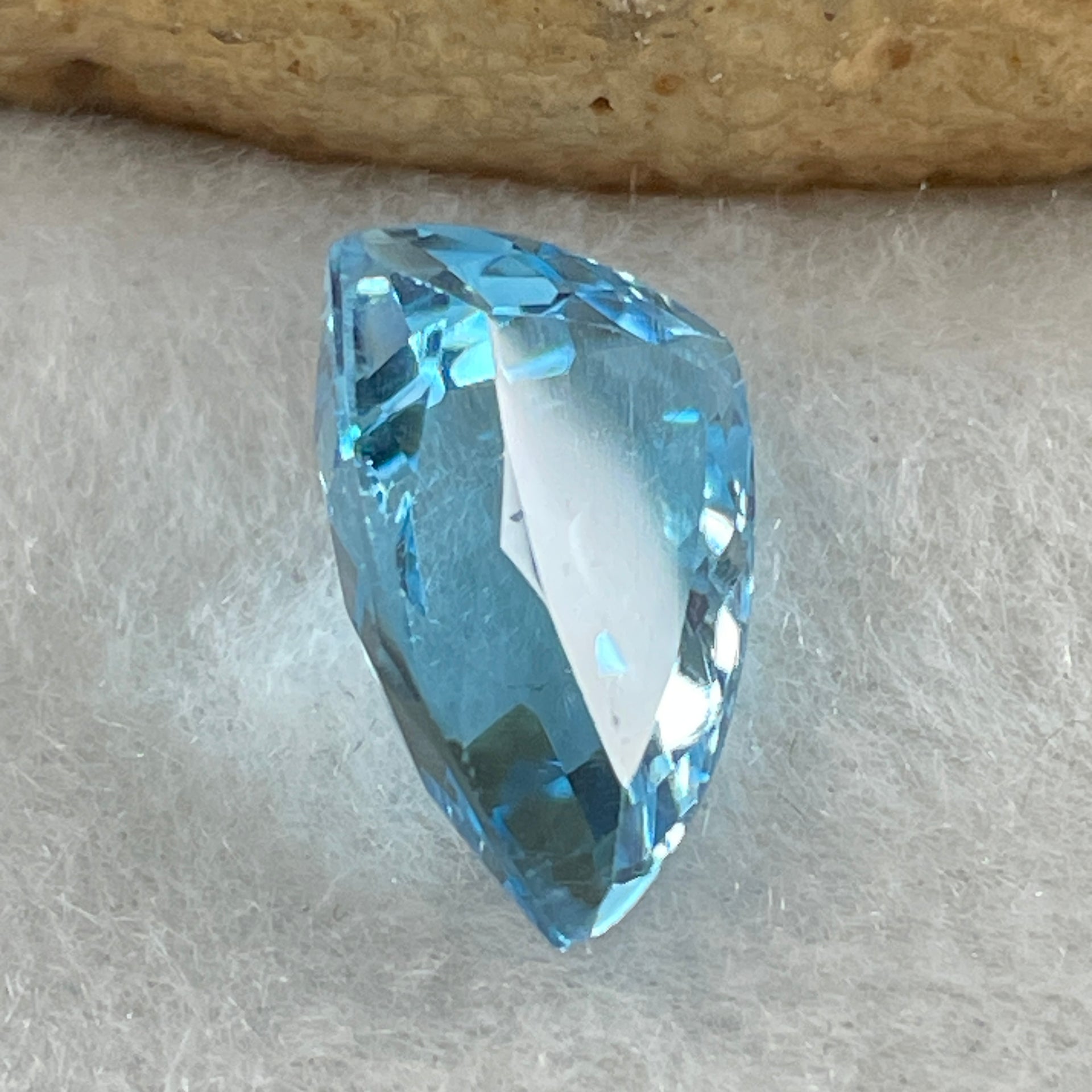 Natural Sky Blue Topaz Trillion Shape 7.69ct 14.4 by 10.2 by 6.9mm - Huangs Jadeite and Jewelry Pte Ltd