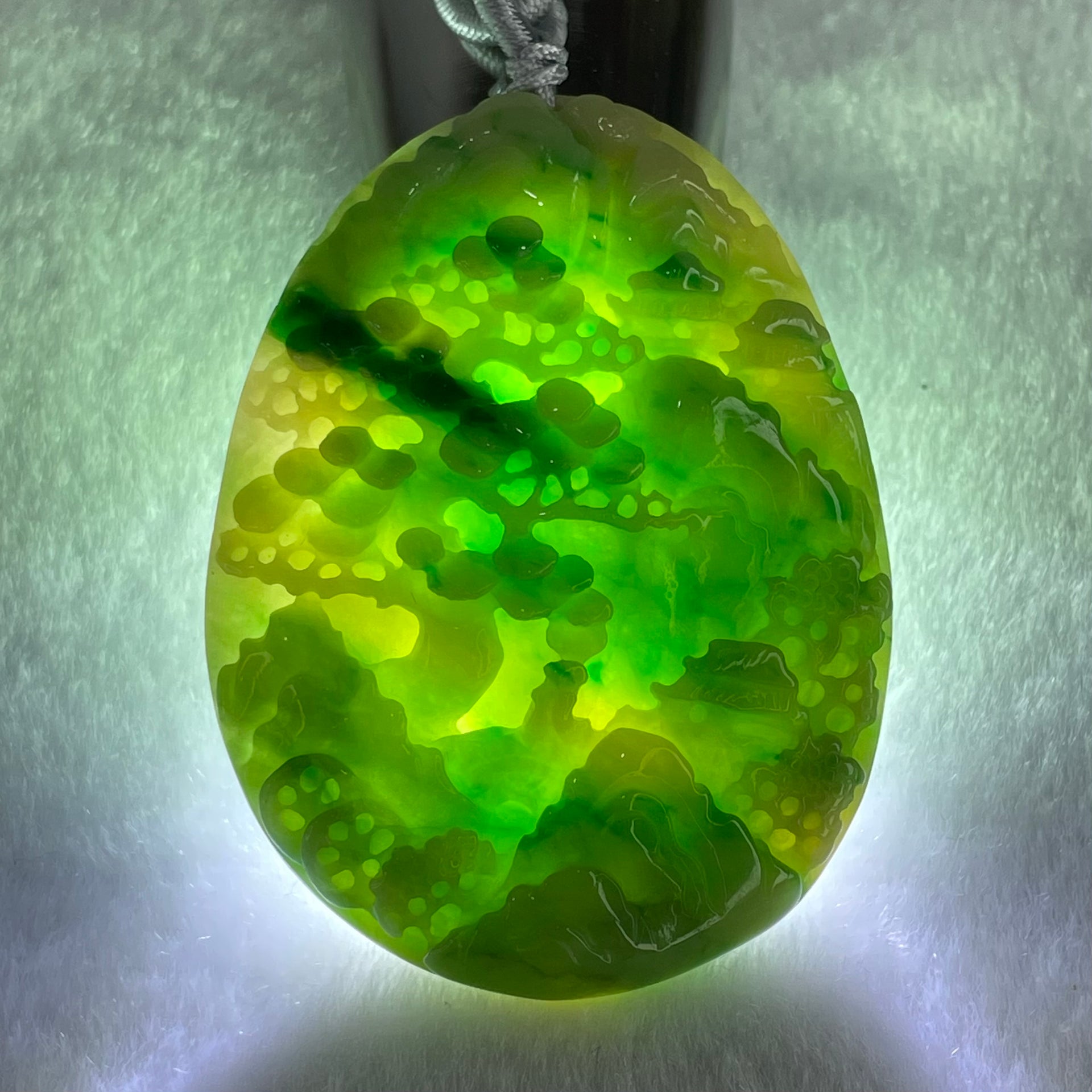 Type A Green with Yellow Spicy Green Piao Hua and Light Brown Patches Jadeite Double Sided Shan Shui with Gui Ren Benefactor Pendant 30.43g 54.0 by 40.8 by 8.4mm - Huangs Jadeite and Jewelry Pte Ltd